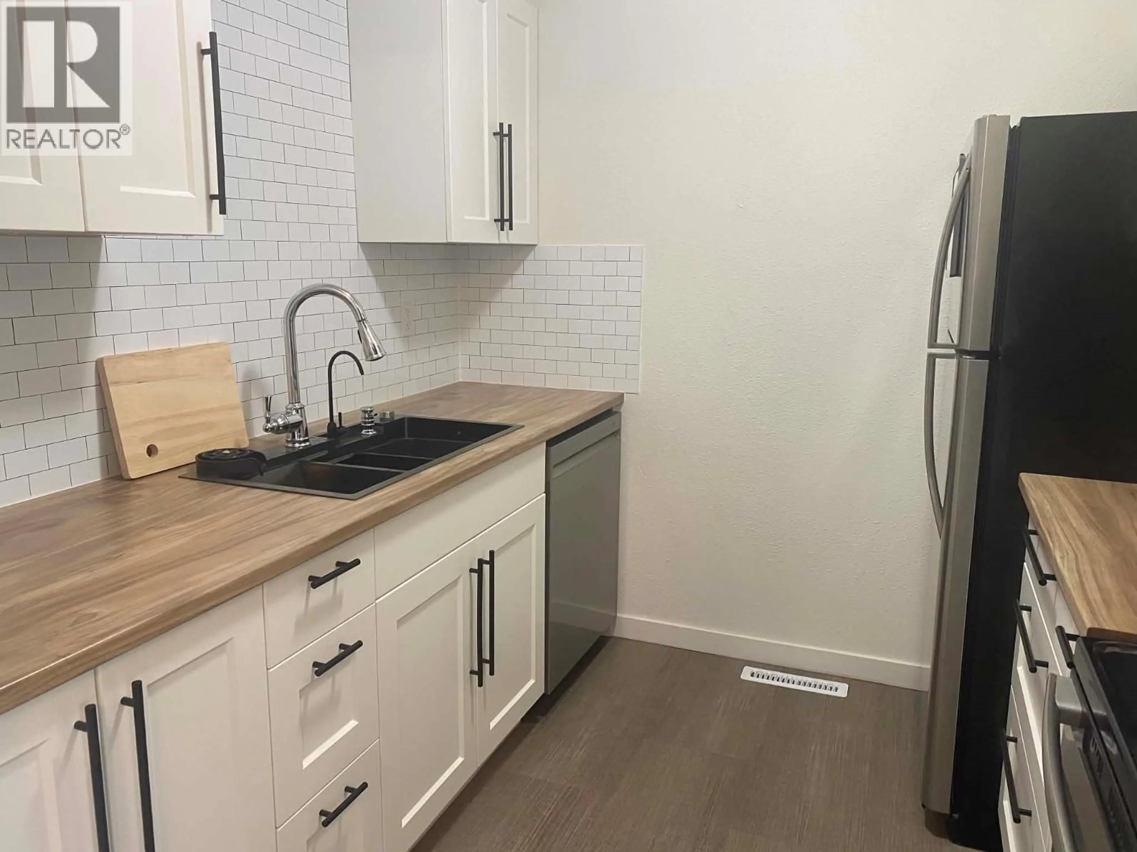 Standard kitchen, wood/laminate floor for 124 - 5100 53 STREET, Chetwynd British Columbia V0C1J0