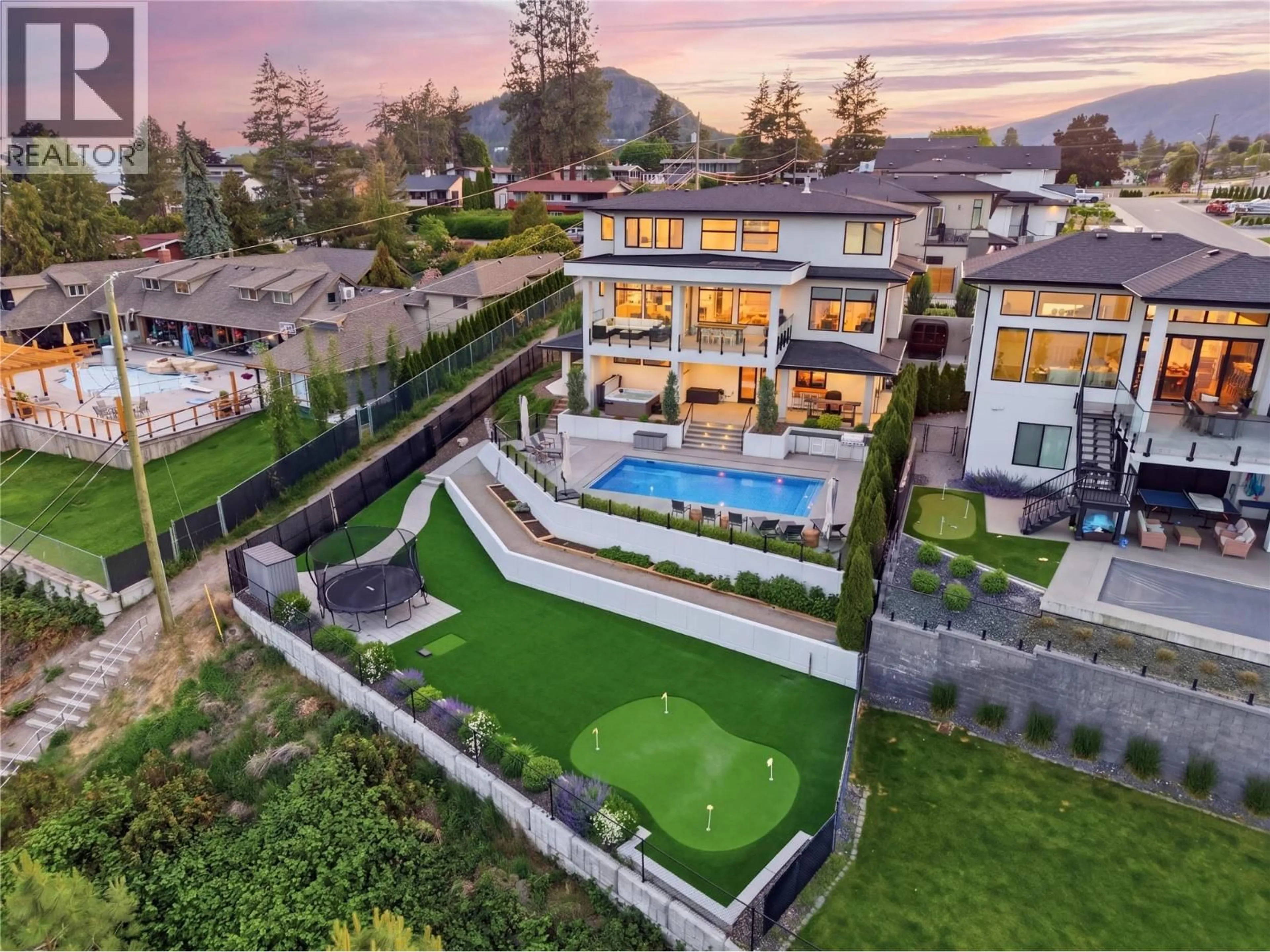 A pic from outside/outdoor area/front of a property/back of a property/a pic from drone, mountain view for 695 LAKE COURT, West Kelowna British Columbia V1Z0A3