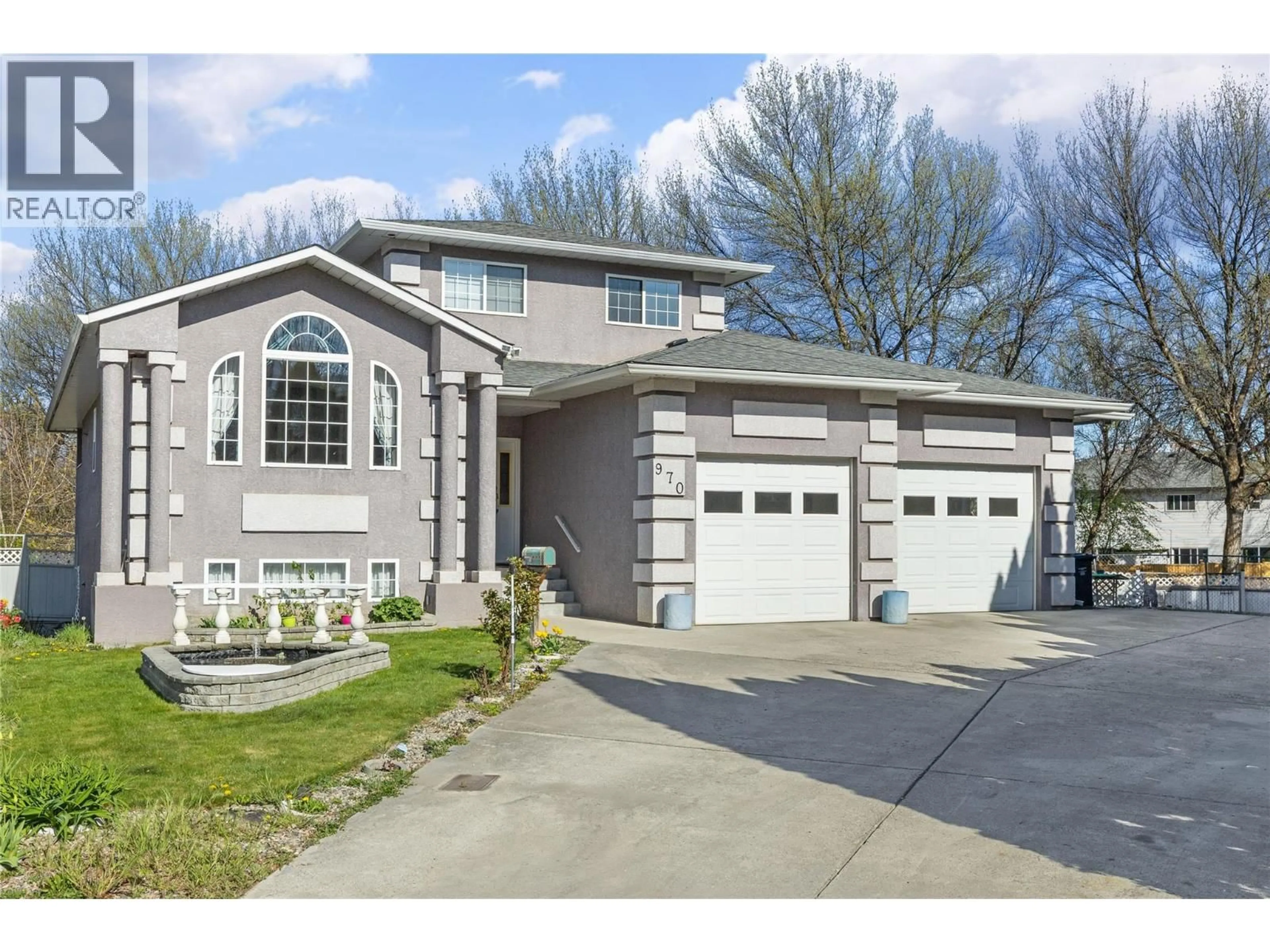 Home with vinyl exterior material, street for 970 MAYGARD ROAD, Kelowna British Columbia V1X5X1