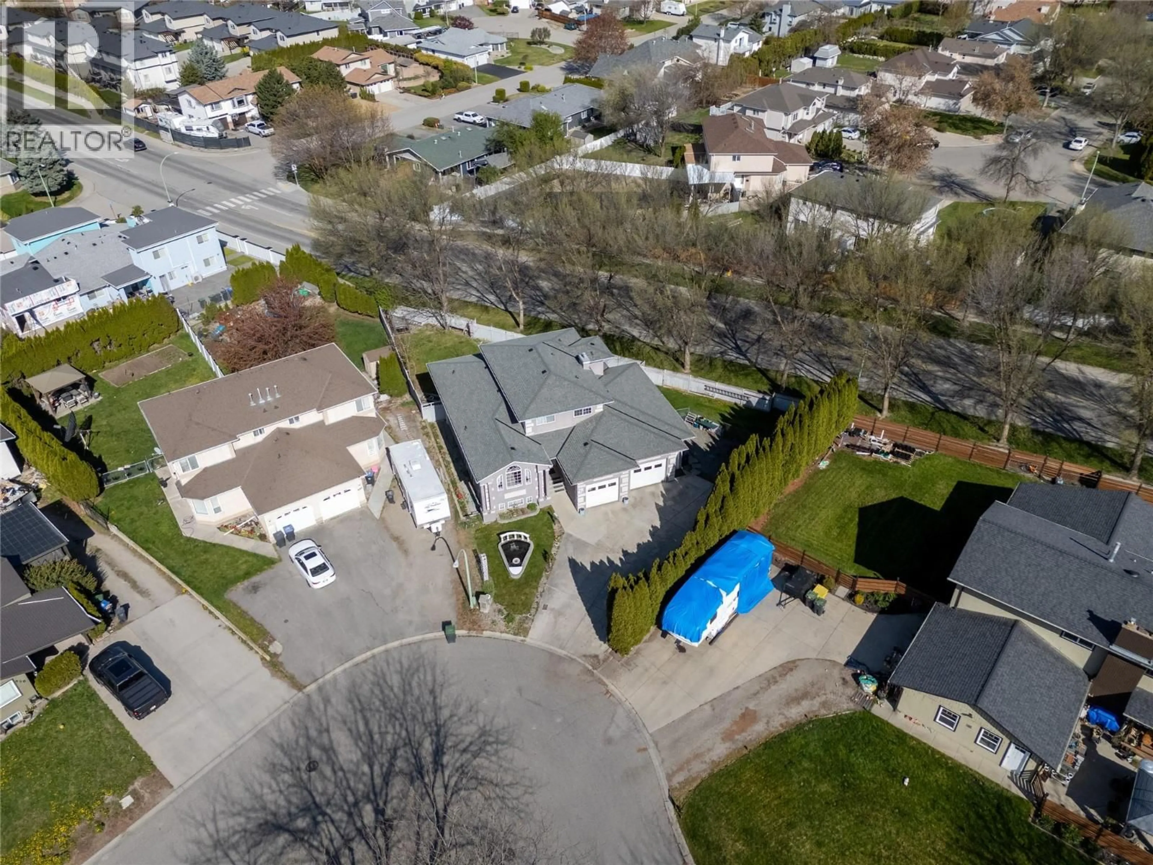 A pic from outside/outdoor area/front of a property/back of a property/a pic from drone, street for 970 MAYGARD ROAD, Kelowna British Columbia V1X5X1