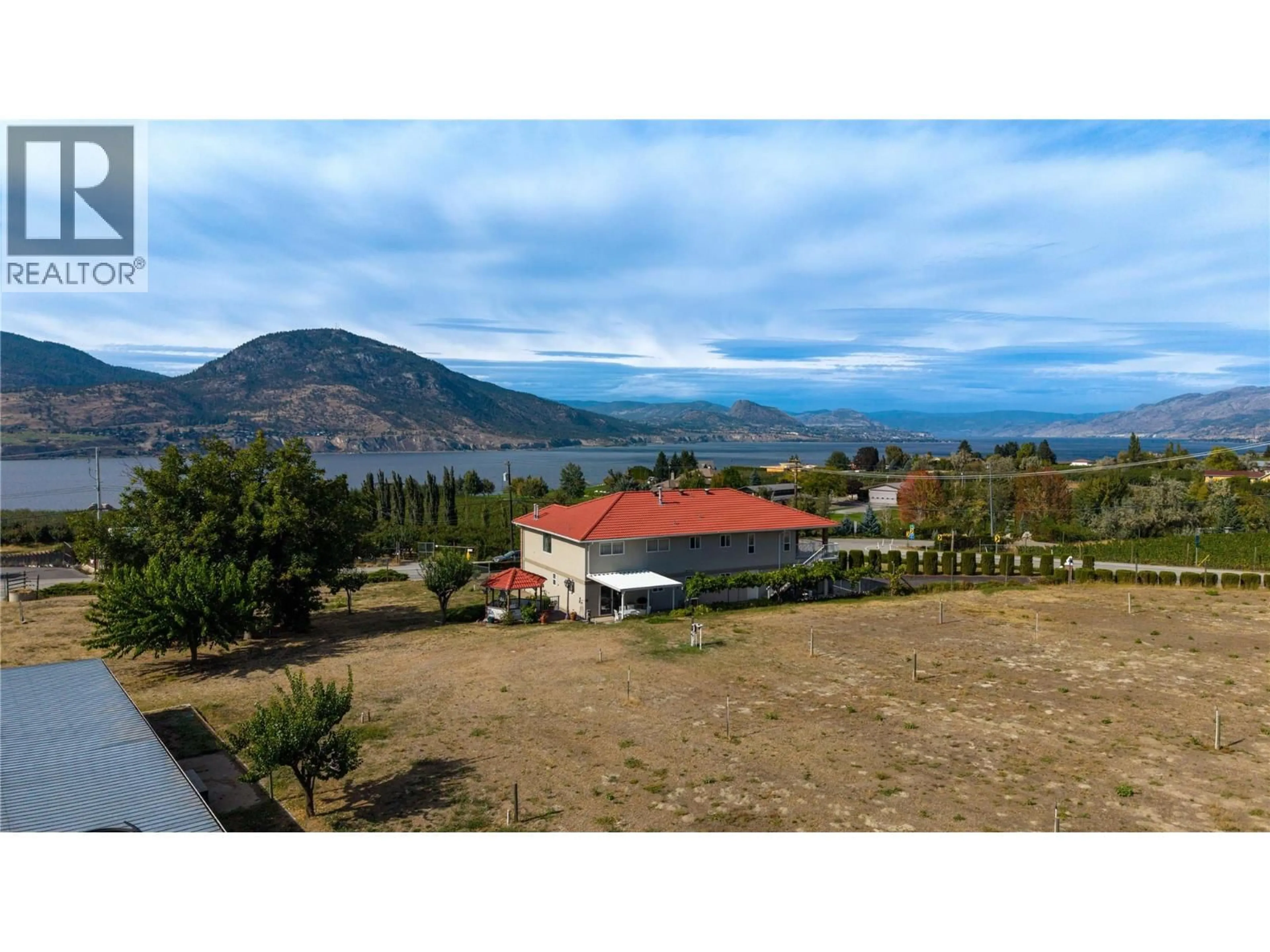 A pic from outside/outdoor area/front of a property/back of a property/a pic from drone, water/lake/river/ocean view for 250 LOWER BENCH ROAD, Penticton British Columbia V2A1A8