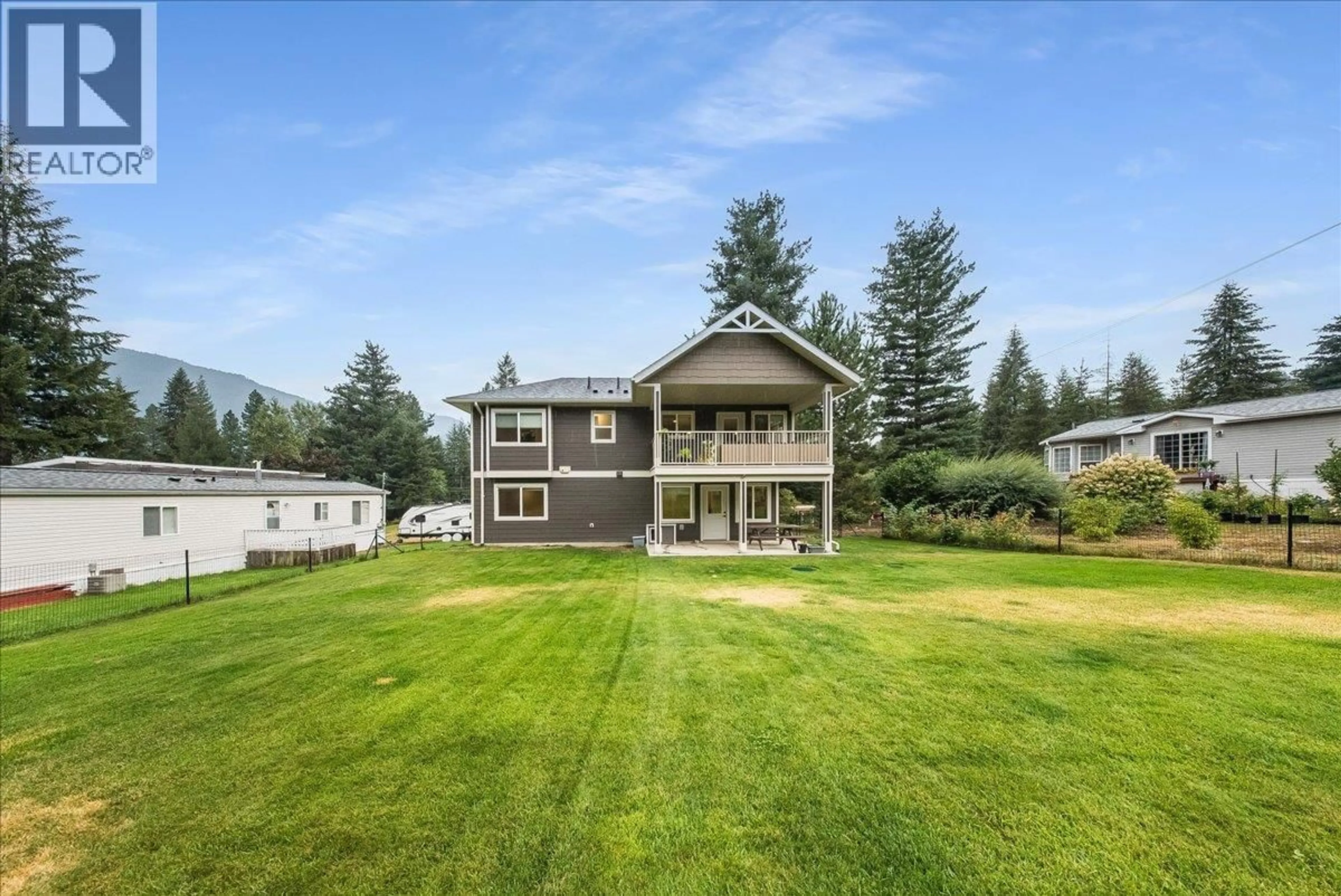 A pic from outside/outdoor area/front of a property/back of a property/a pic from drone, water/lake/river/ocean view for 1065 LOWER CHINA CREEK ROAD, Castlegar British Columbia V0G1G0