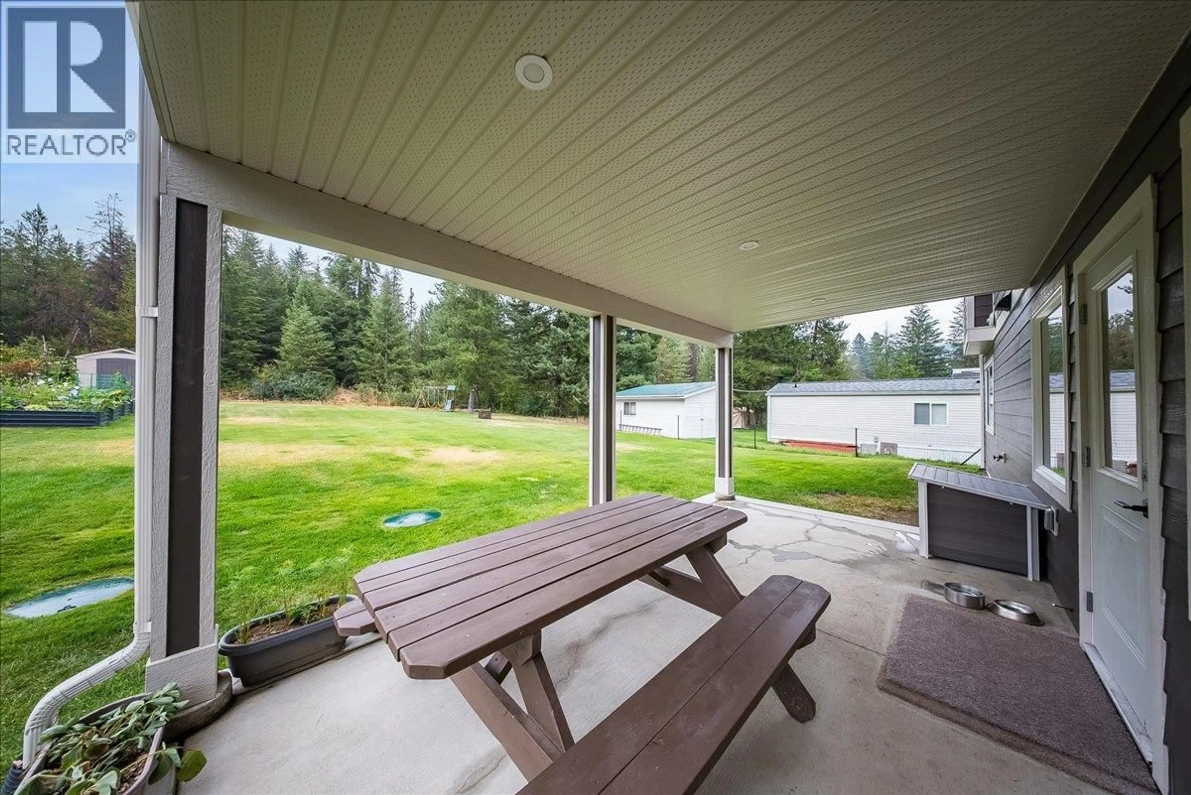 Patio, water/lake/river/ocean view for 1065 LOWER CHINA CREEK ROAD, Castlegar British Columbia V0G1G0