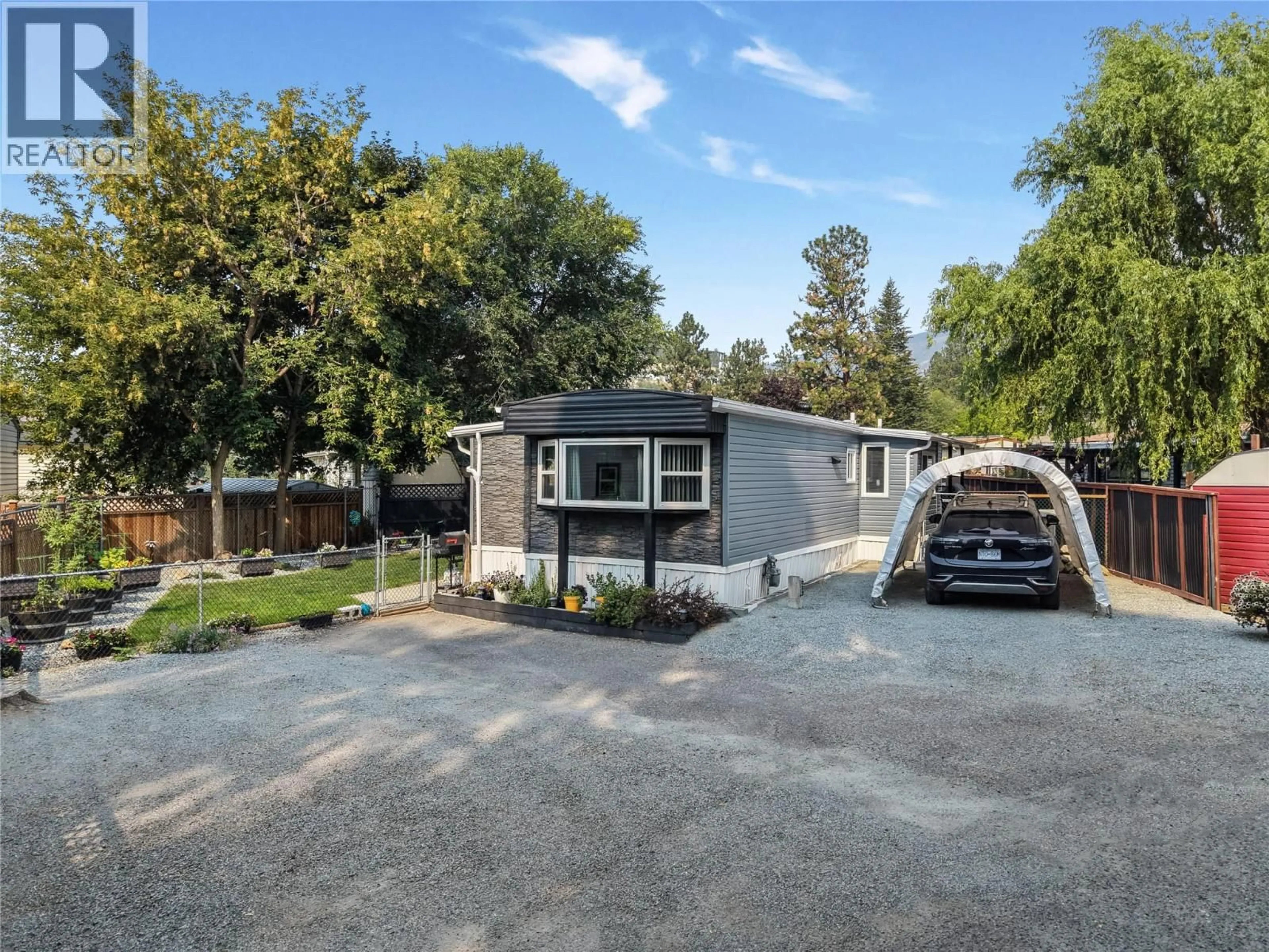 A pic from outside/outdoor area/front of a property/back of a property/a pic from drone, street for 85 - 1999 97 HIGHWAY SOUTH, West Kelowna British Columbia V1Z1B2
