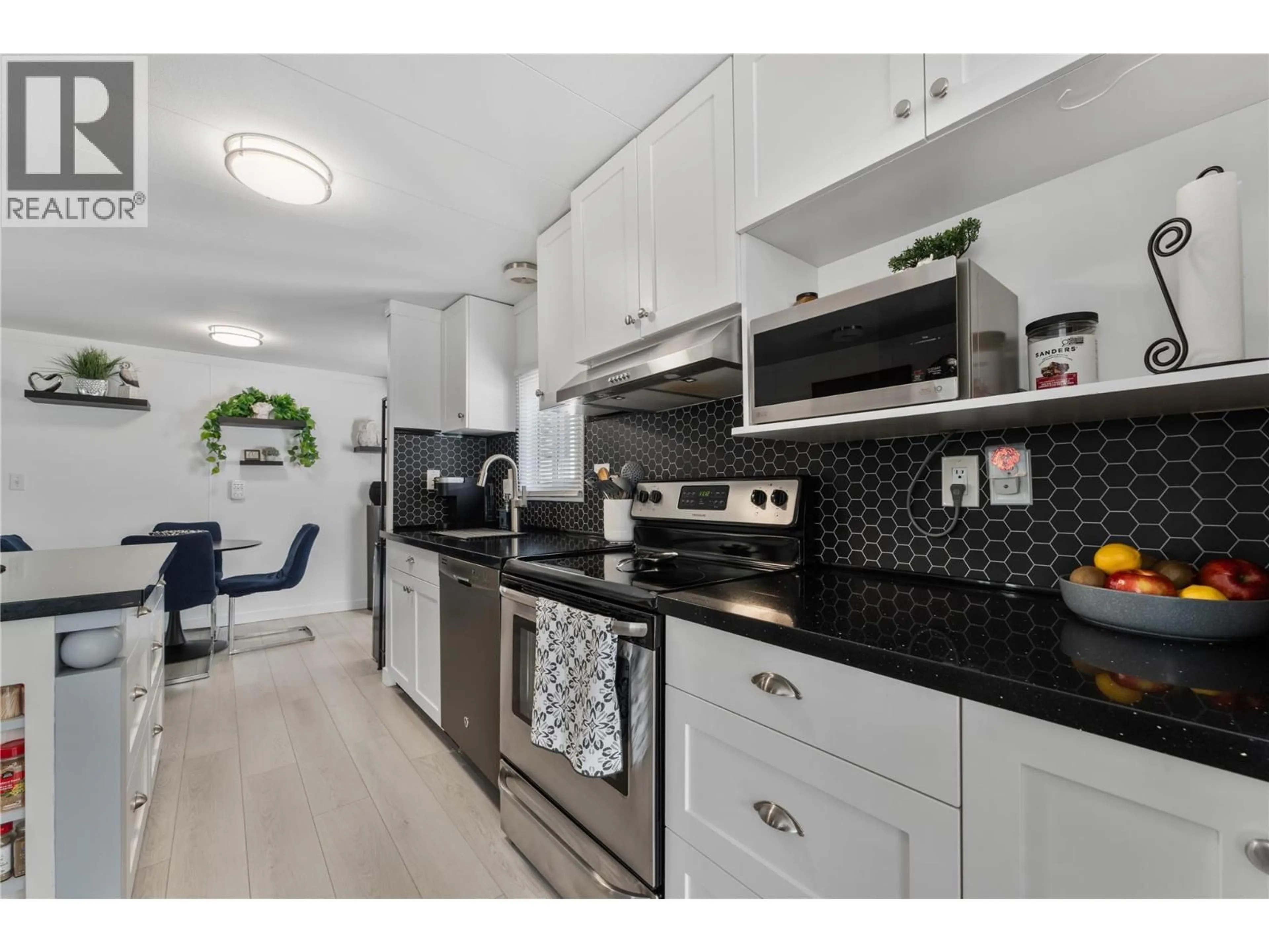 Open concept kitchen, ceramic/tile floor for 85 - 1999 97 HIGHWAY SOUTH, West Kelowna British Columbia V1Z1B2