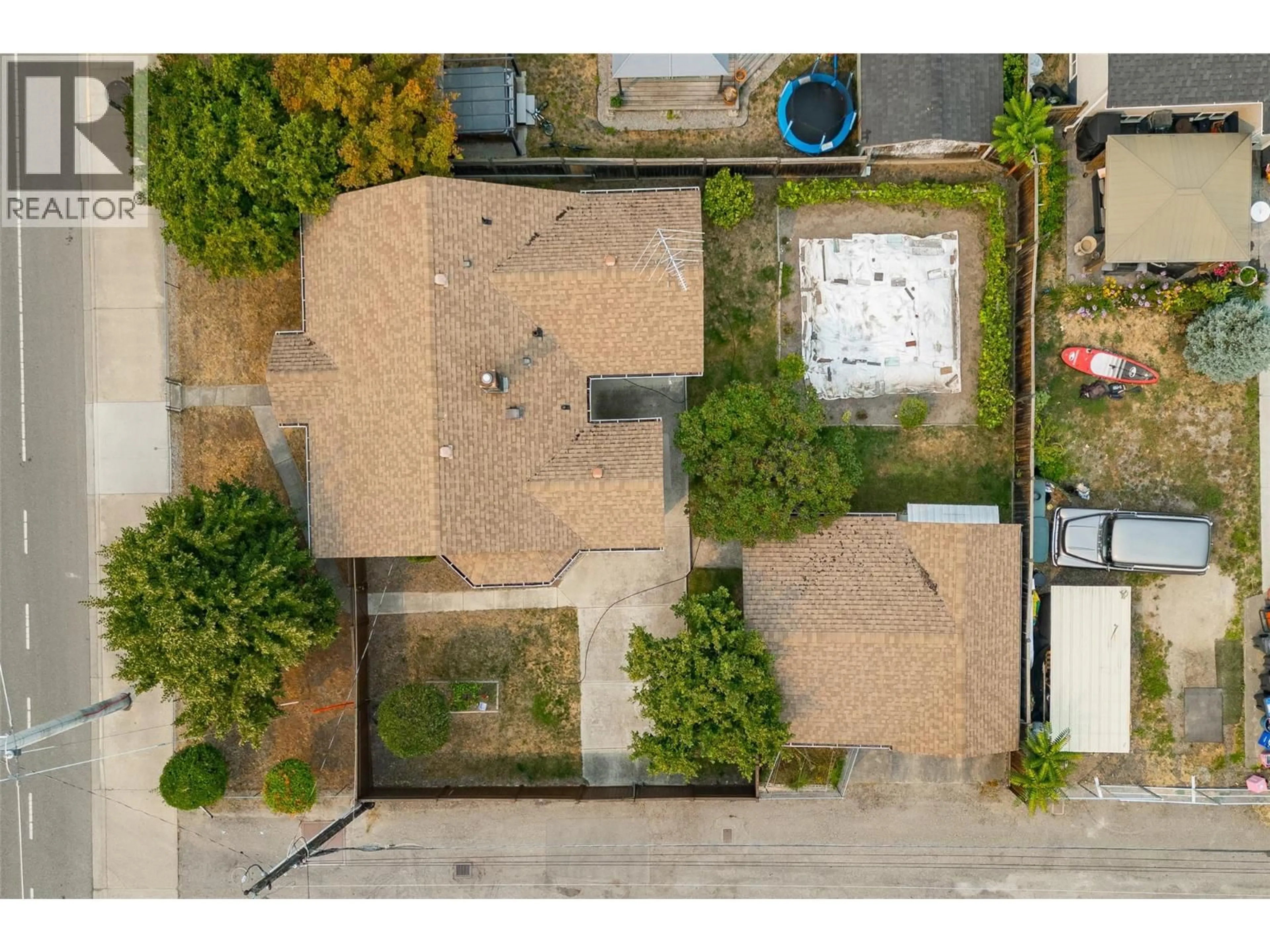 A pic from outside/outdoor area/front of a property/back of a property/a pic from drone, street for 1339 RICHTER STREET, Kelowna British Columbia V1Y2L5