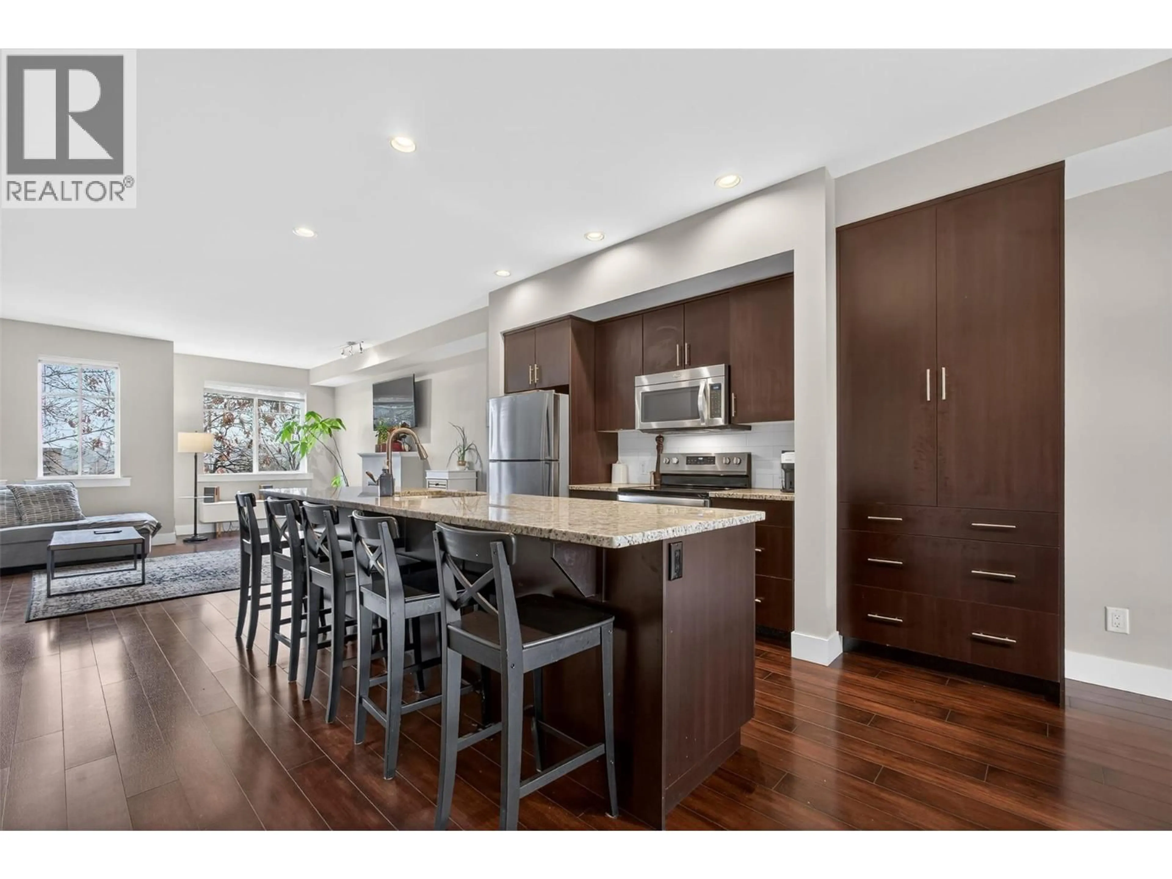 Open concept kitchen, wood/laminate floor for 9 - 433 MCCARREN AVENUE, Kelowna British Columbia V1W4T8