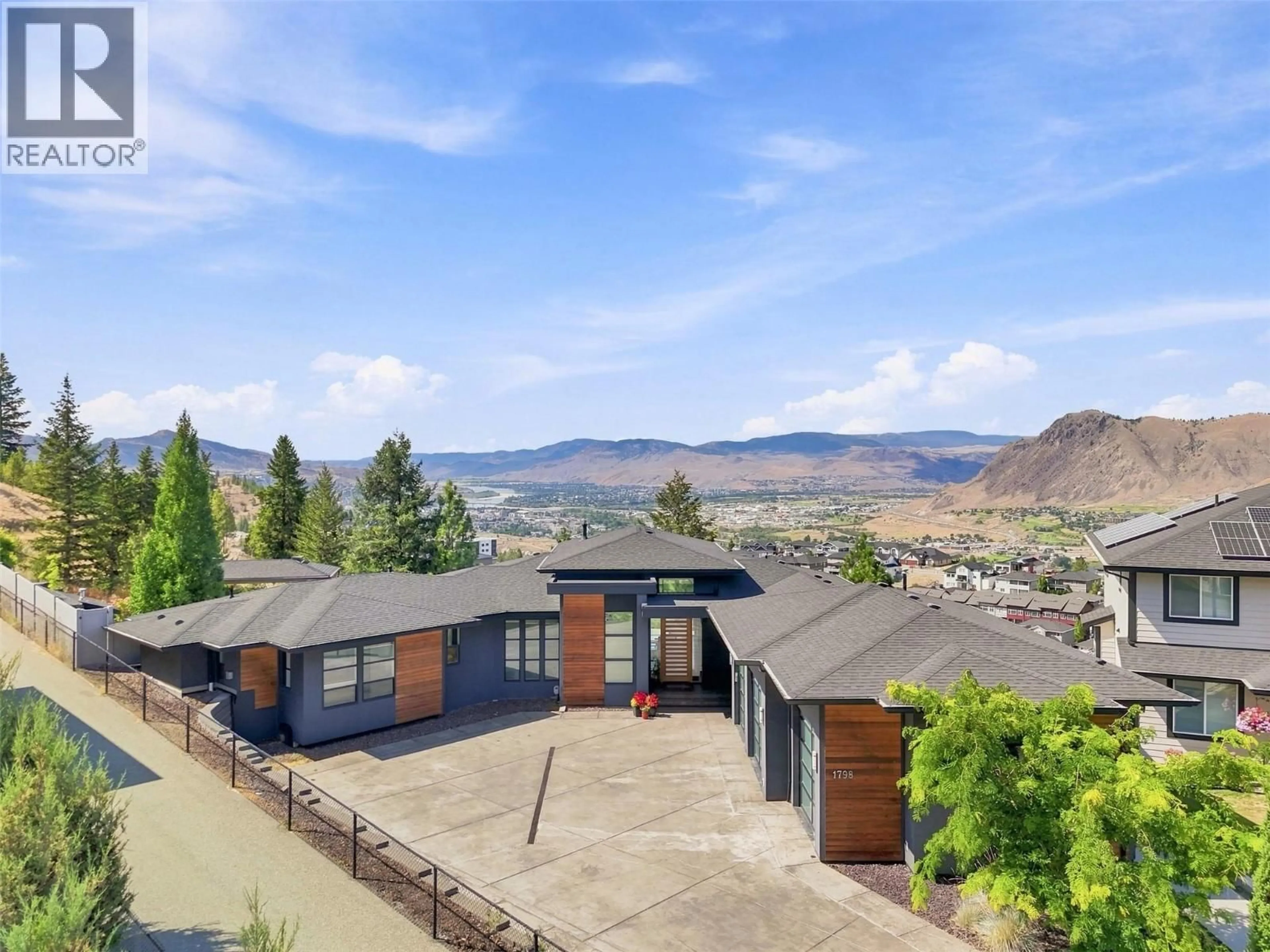 A pic from outside/outdoor area/front of a property/back of a property/a pic from drone, mountain view for 1798 GALORE PLACE, Kamloops British Columbia V2E0A7