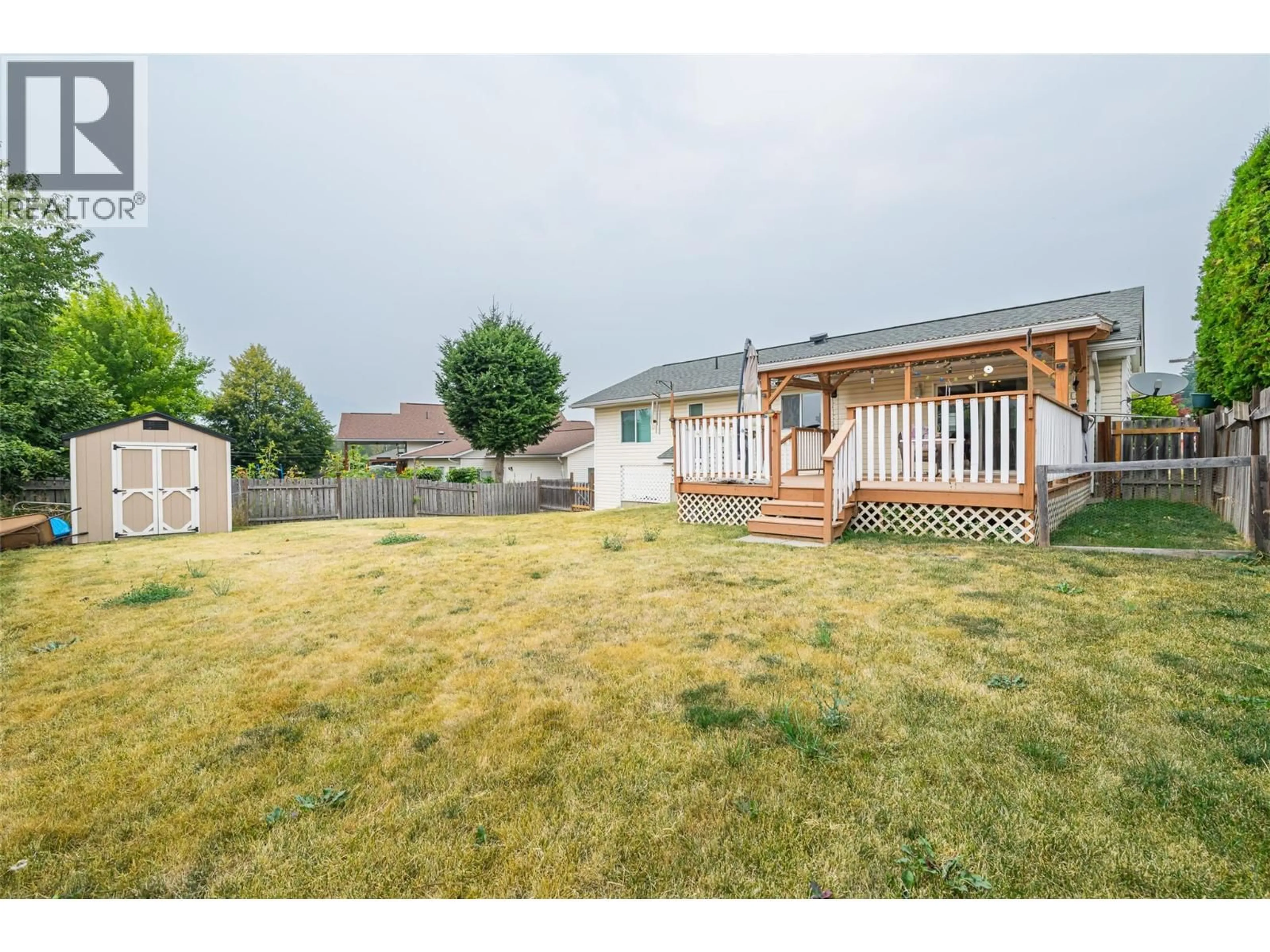 A pic from outside/outdoor area/front of a property/back of a property/a pic from drone, street for 307 DUGAN STREET, Creston British Columbia V0B1G3