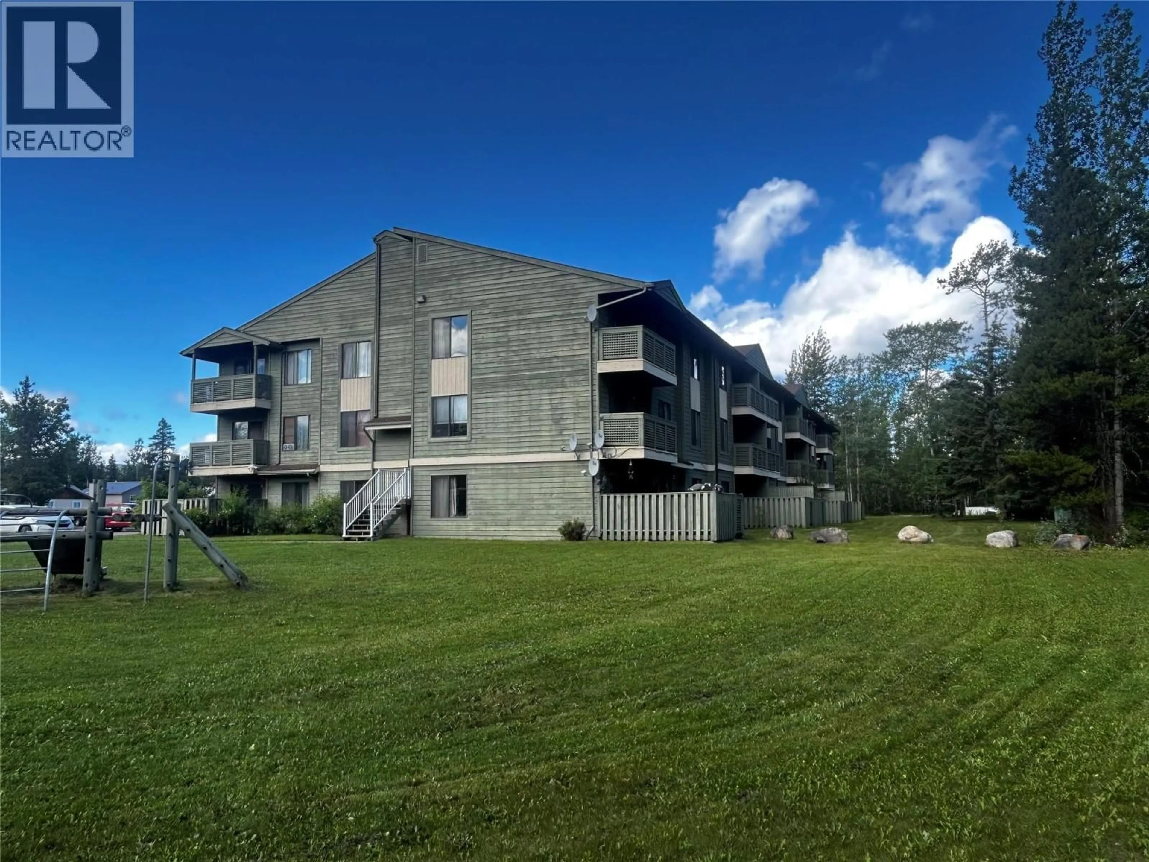 A pic from outside/outdoor area/front of a property/back of a property/a pic from drone, mountain view for 309 - 185 CHAMBERLAIN CRESCENT, Tumbler Ridge British Columbia V0C2W0