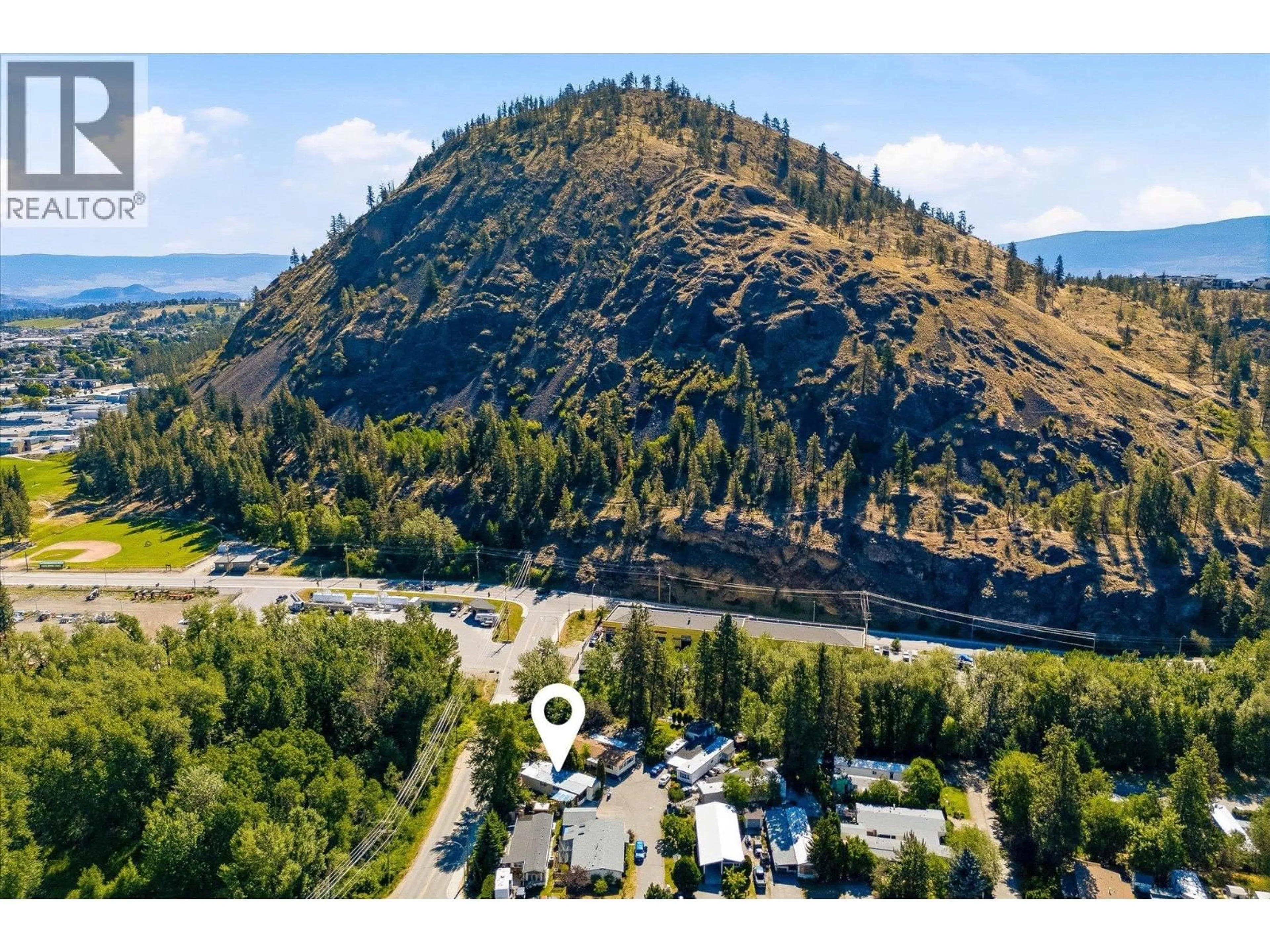 A pic from outside/outdoor area/front of a property/back of a property/a pic from drone, mountain view for 87 - 1929 HIGHWAY 97 OTHER SOUTH, West Kelowna British Columbia V1Z2Z1