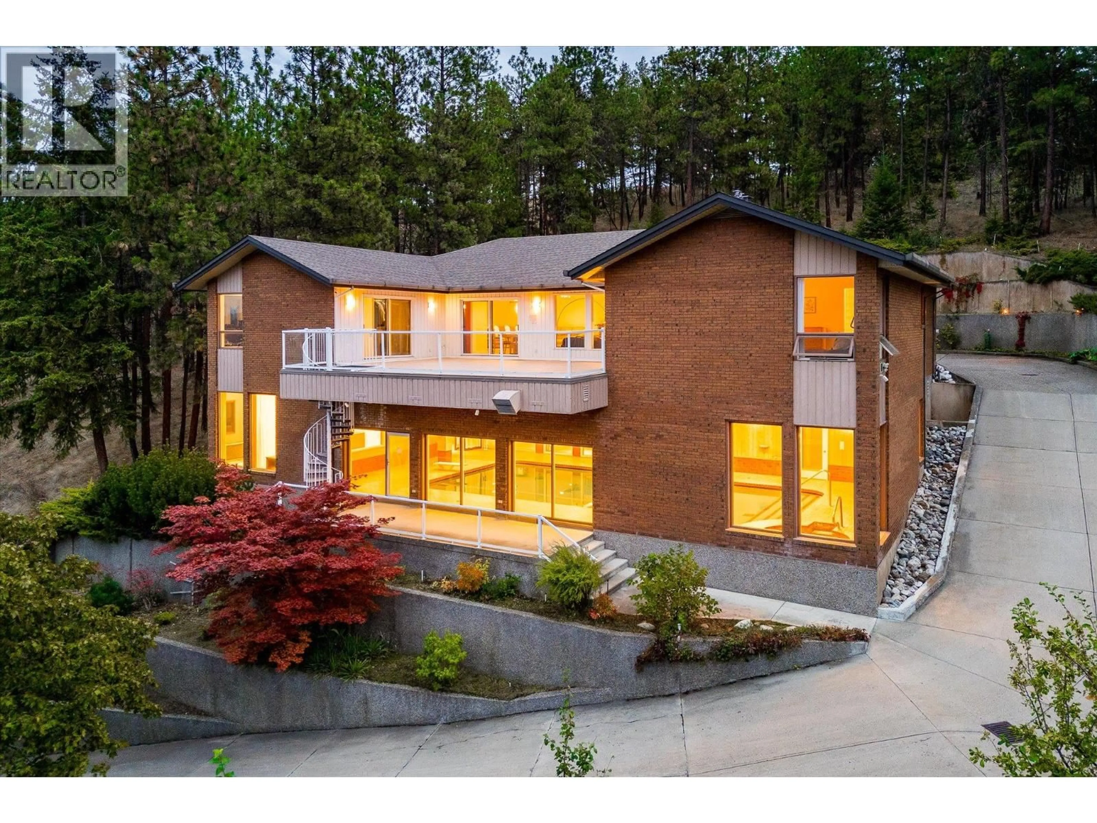 Home with brick exterior material, unknown for 1045 BARTHOLOMEW COURT, Kelowna British Columbia V1W4N2