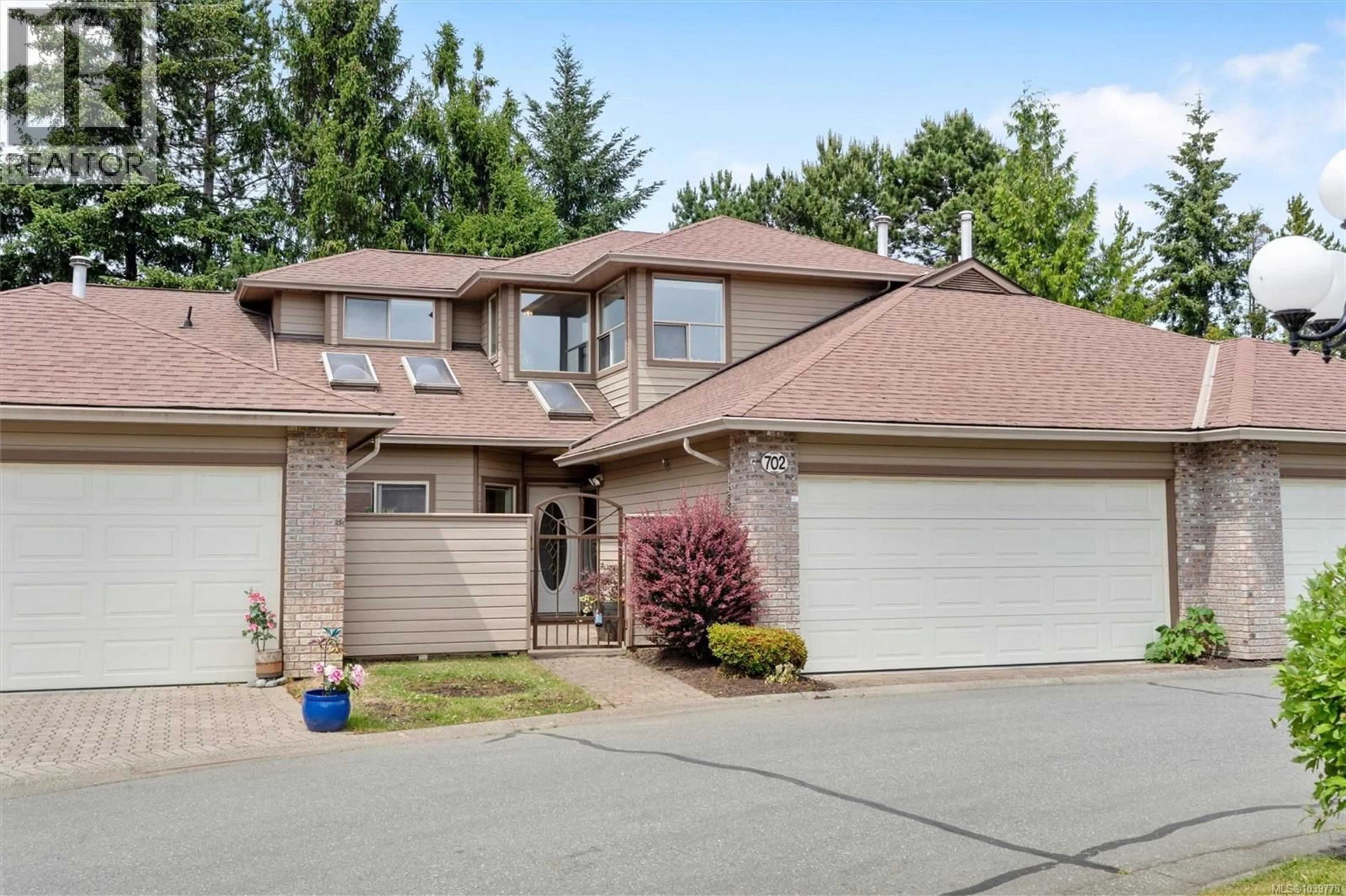 Home with vinyl exterior material, street for 702 - 4515 PIPELINE ROAD, Saanich British Columbia V8Z5M3