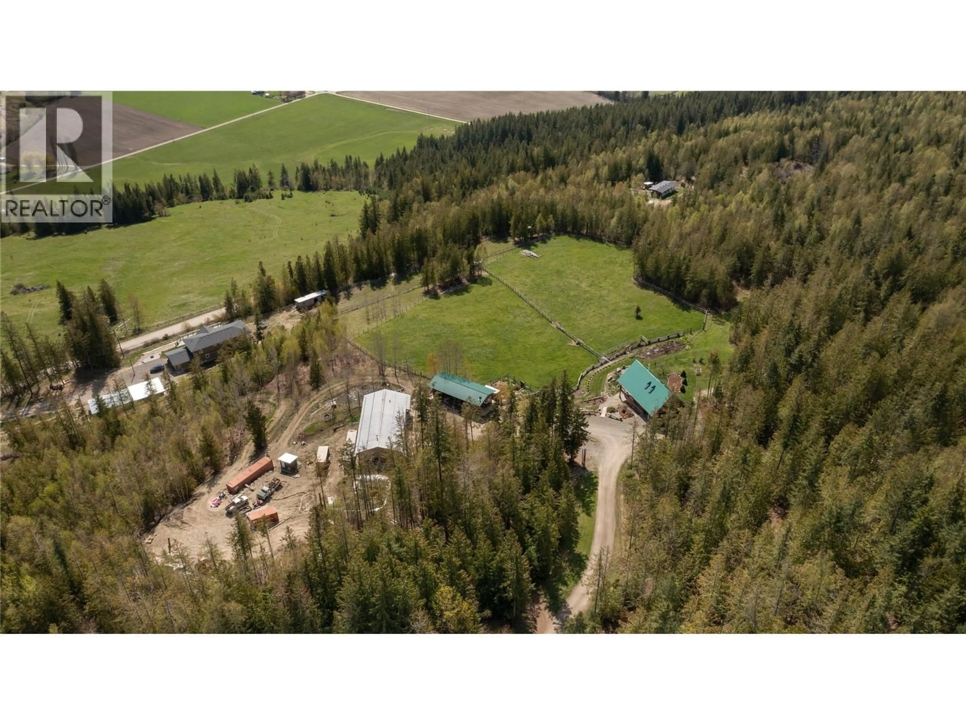 A pic from outside/outdoor area/front of a property/back of a property/a pic from drone, forest/trees view for 310 GRANDVIEW BENCH ROAD, Grindrod British Columbia V0E1Y0