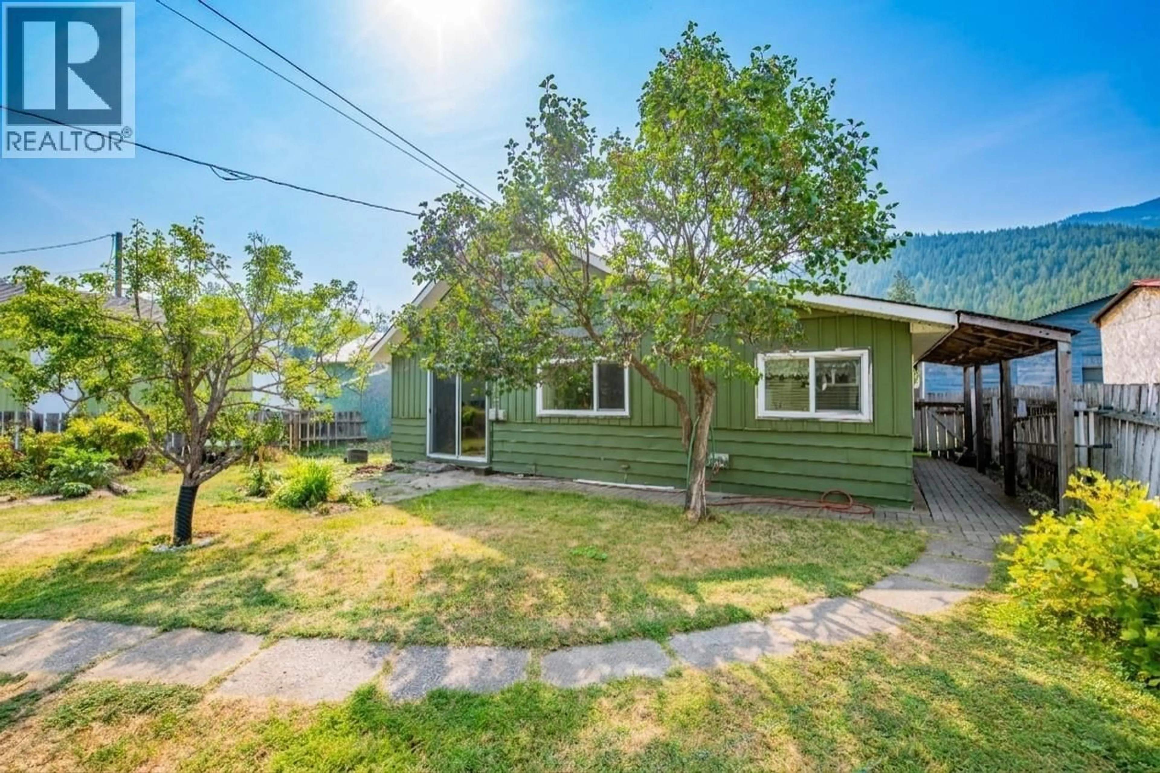 A pic from outside/outdoor area/front of a property/back of a property/a pic from drone, street for 5727 PONDEROSA ROAD, Falkland British Columbia V0E1W0