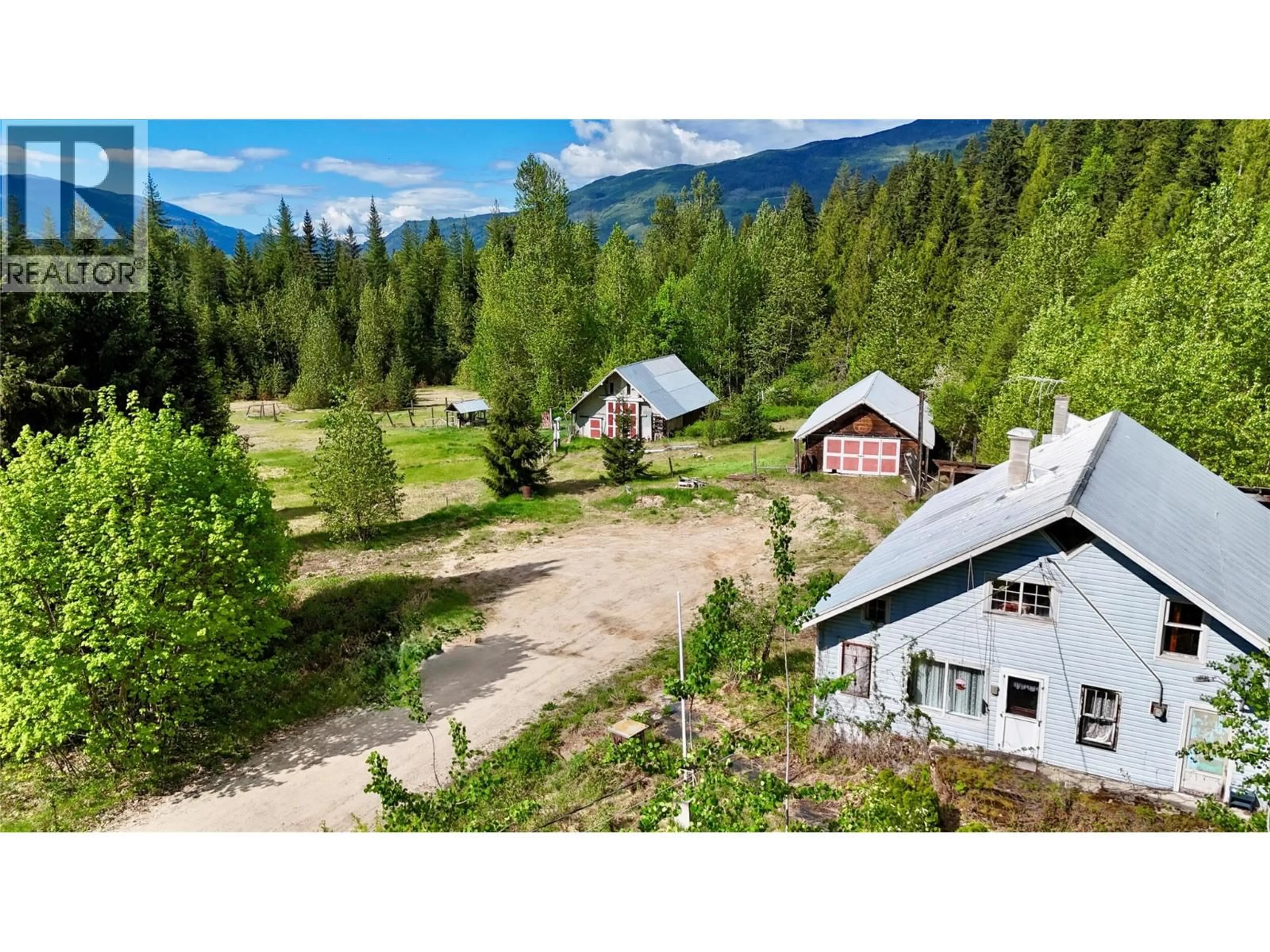 A pic from outside/outdoor area/front of a property/back of a property/a pic from drone, mountain view for 4751 LYBARGER ROAD, Malakwa British Columbia V0E2J0