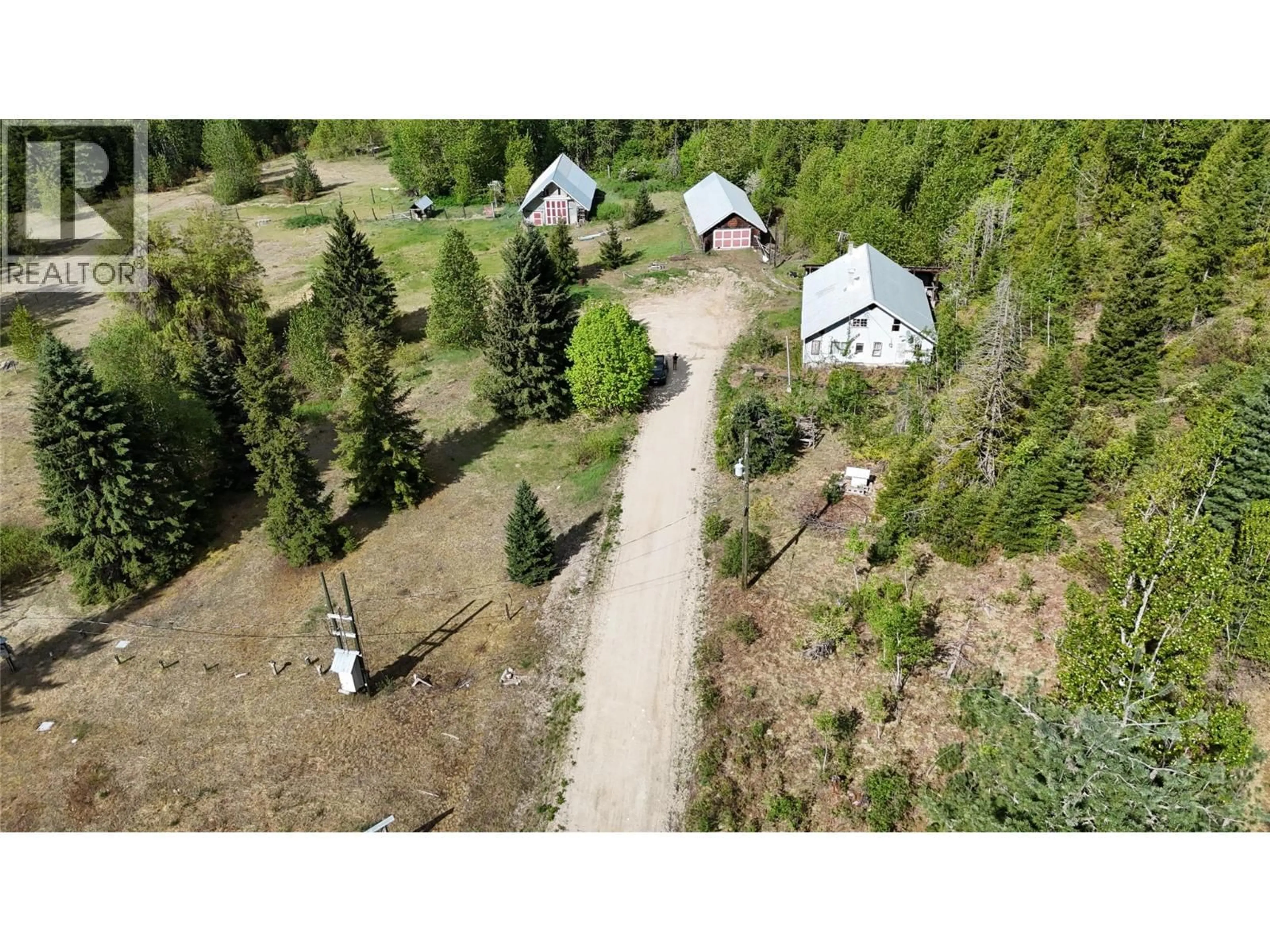 A pic from outside/outdoor area/front of a property/back of a property/a pic from drone, forest/trees view for 4751 LYBARGER ROAD, Malakwa British Columbia V0E2J0