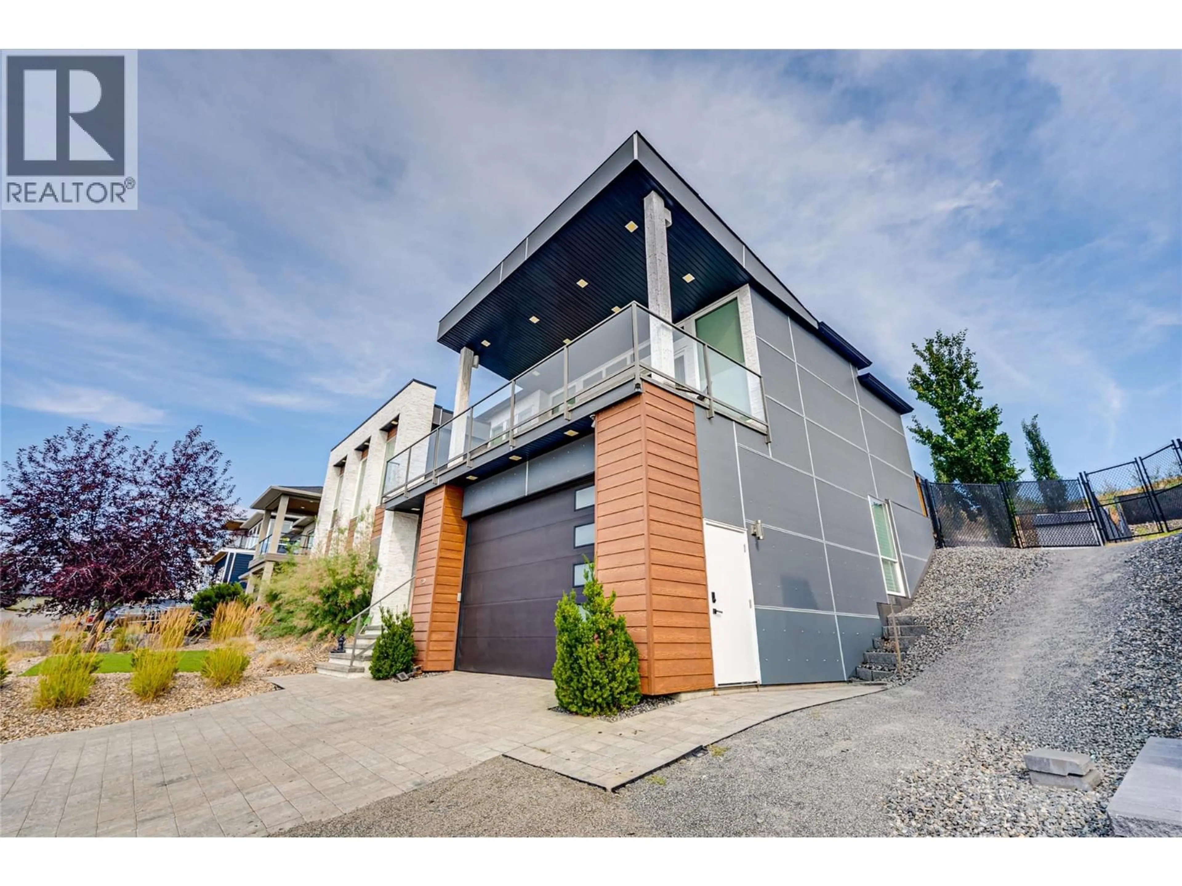Home with brick exterior material, street for 7180 APEX DRIVE, Vernon British Columbia V1B4E4