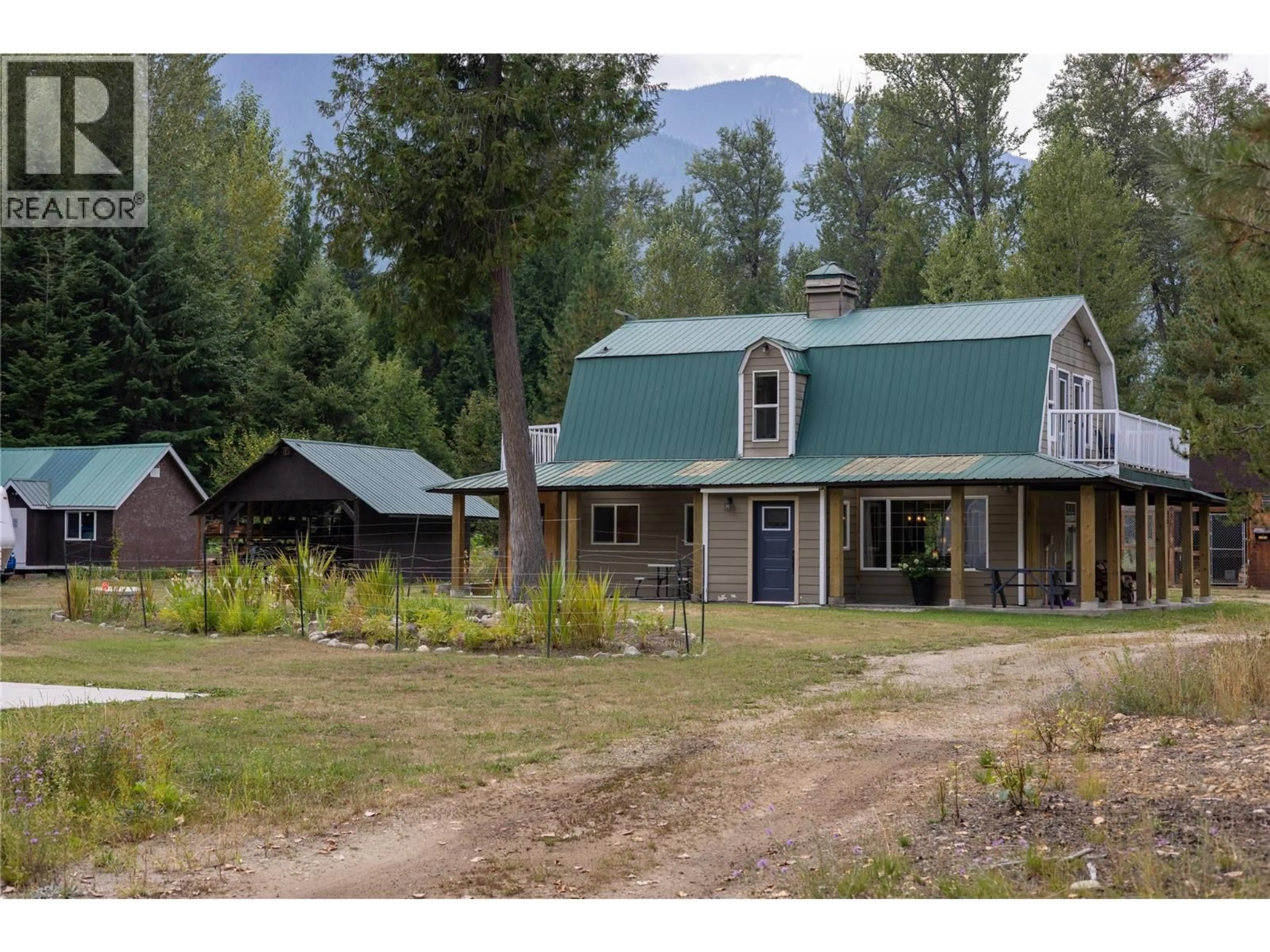 A pic from outside/outdoor area/front of a property/back of a property/a pic from drone, mountain view for 4453 PASSMORE UPPER ROAD, Passmore British Columbia V0G2J0