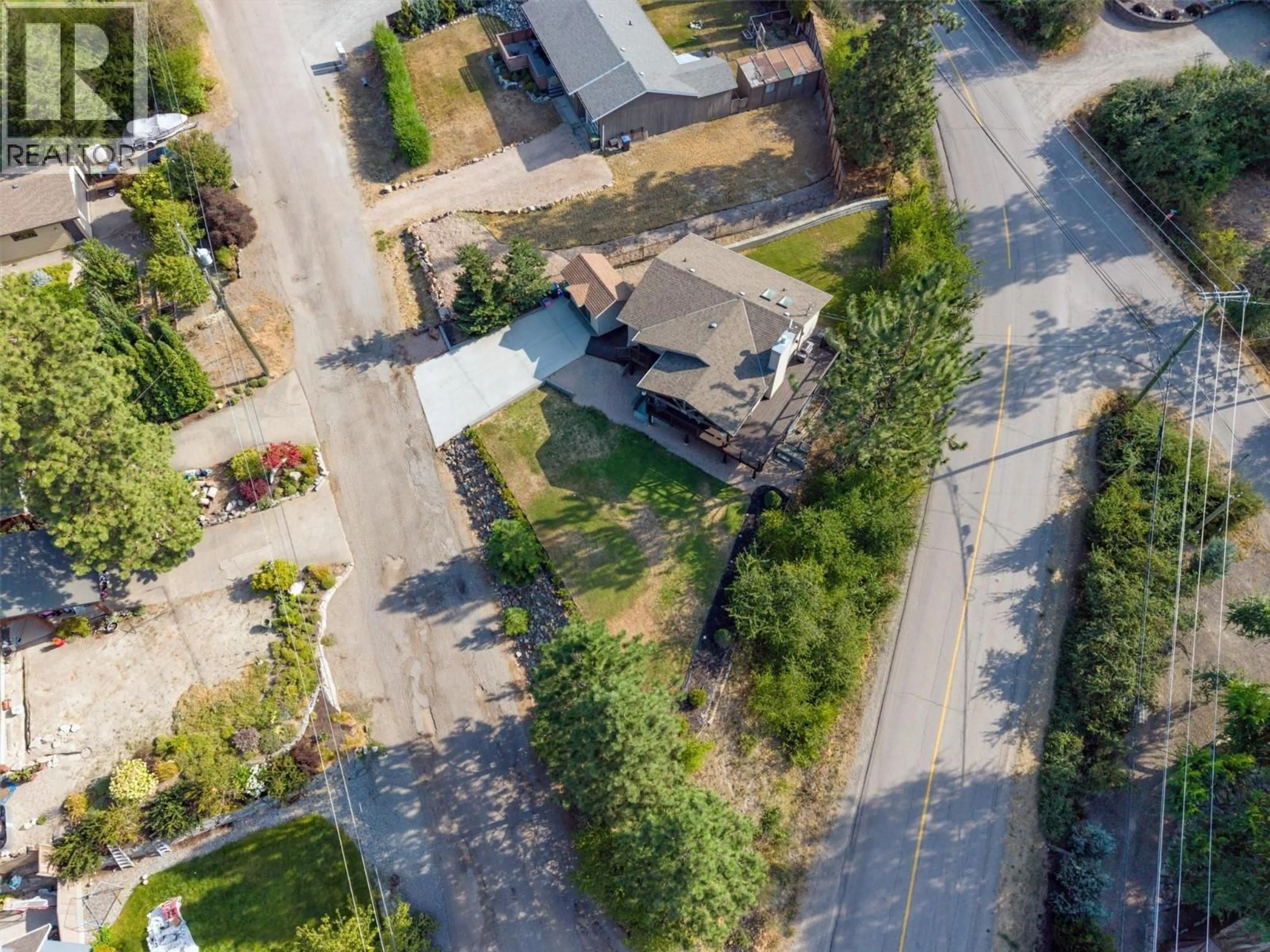 A pic from outside/outdoor area/front of a property/back of a property/a pic from drone, street for 16621 MAKI ROAD, Lake Country British Columbia V4V1C2