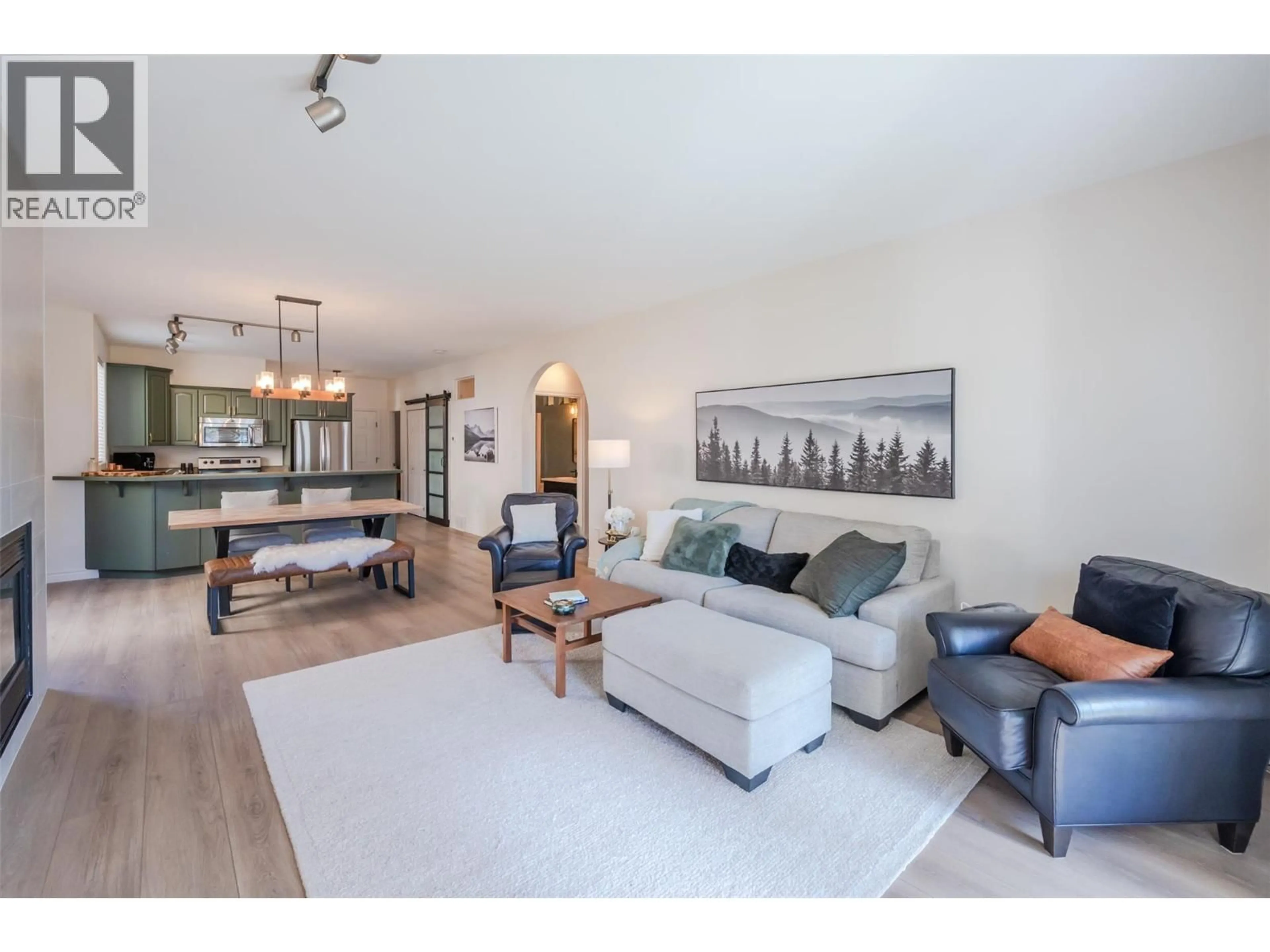 Living room with furniture, unknown for 102 - 1065 CHURCHILL AVENUE, Penticton British Columbia V2A9A7