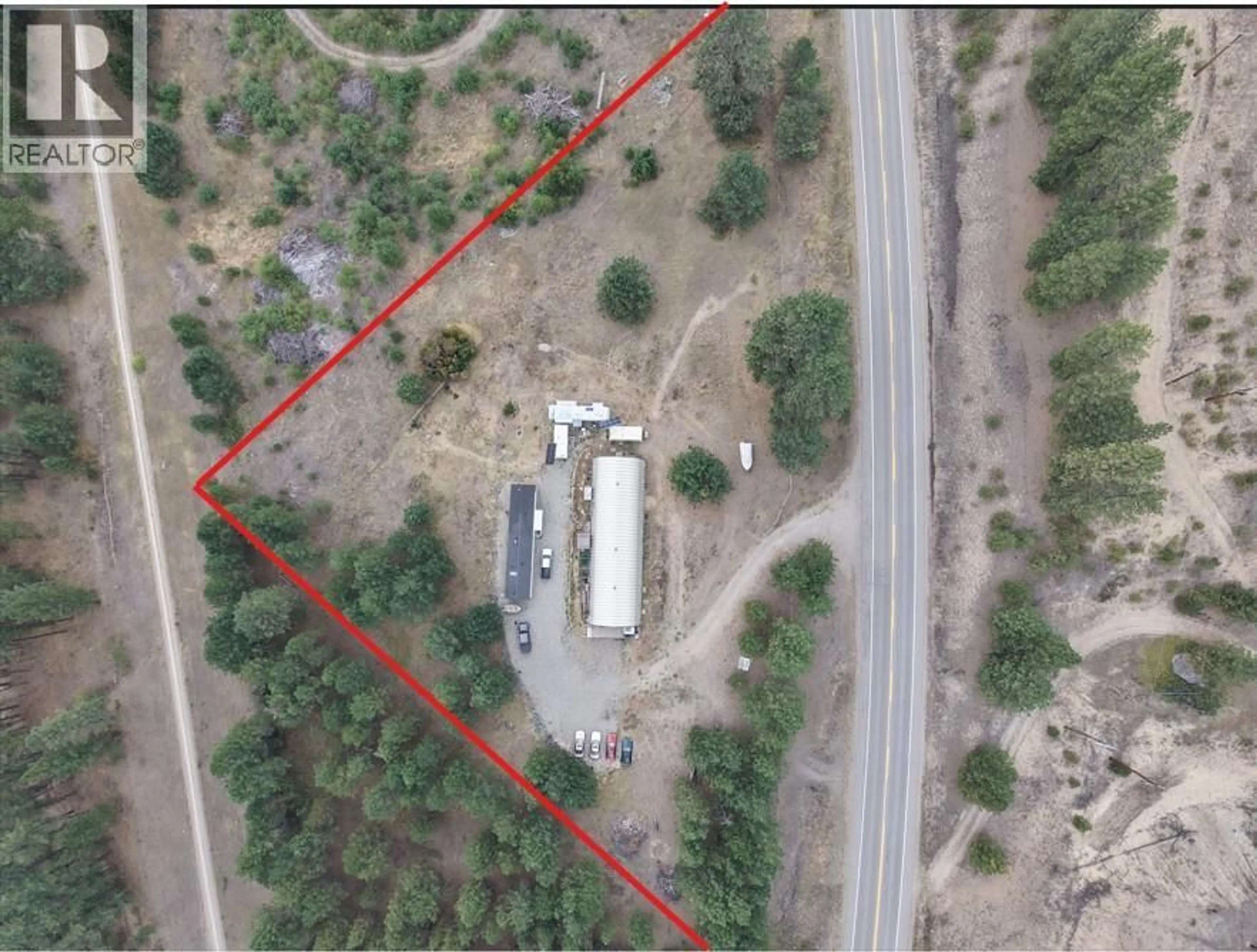 A pic from outside/outdoor area/front of a property/back of a property/a pic from drone, building for 765 3 HIGHWAY, Grand Forks British Columbia V0H1H0