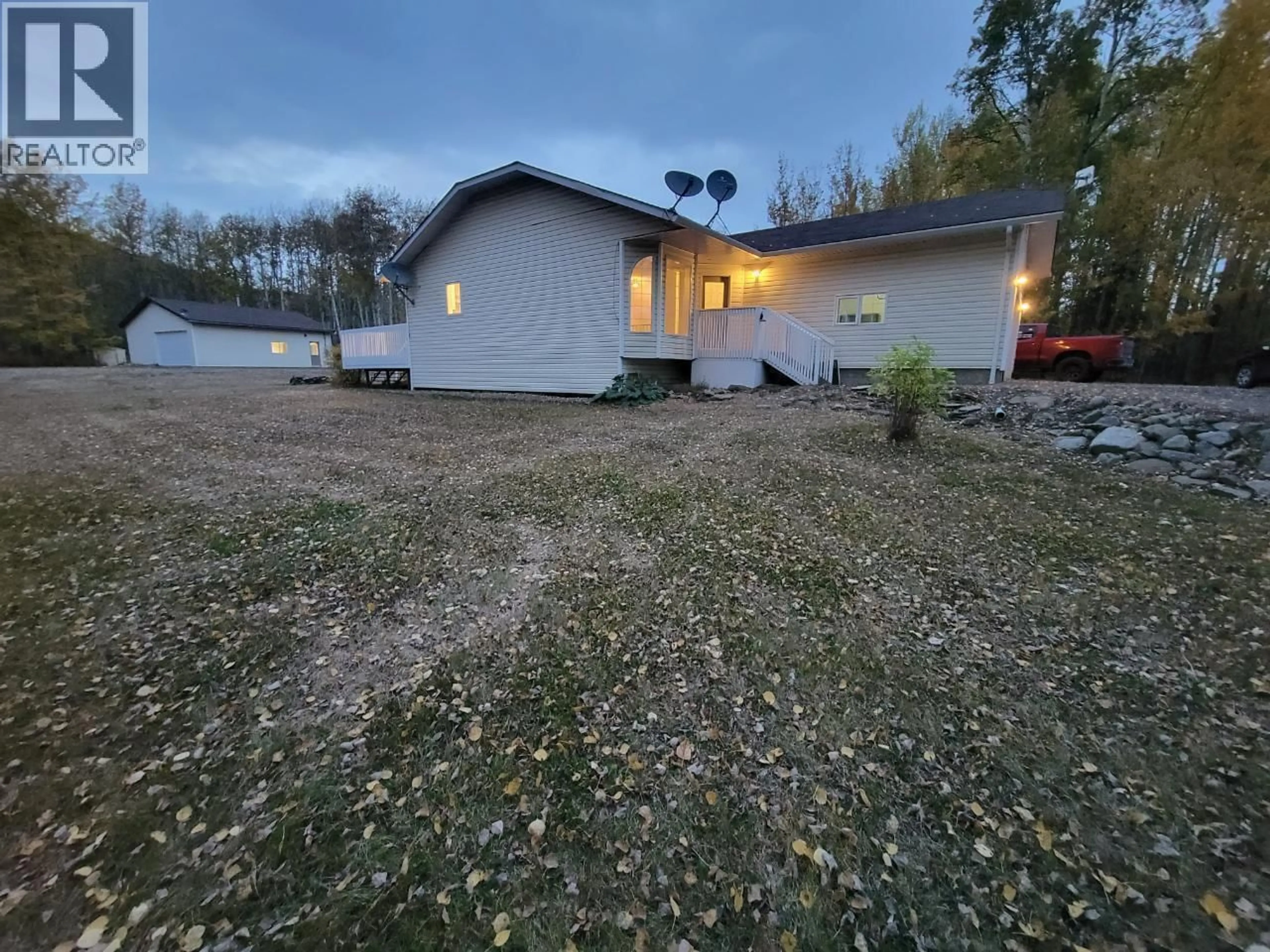 A pic from outside/outdoor area/front of a property/back of a property/a pic from drone, street for 6708 CURRIER ROAD, Chetwynd British Columbia V0C1J0