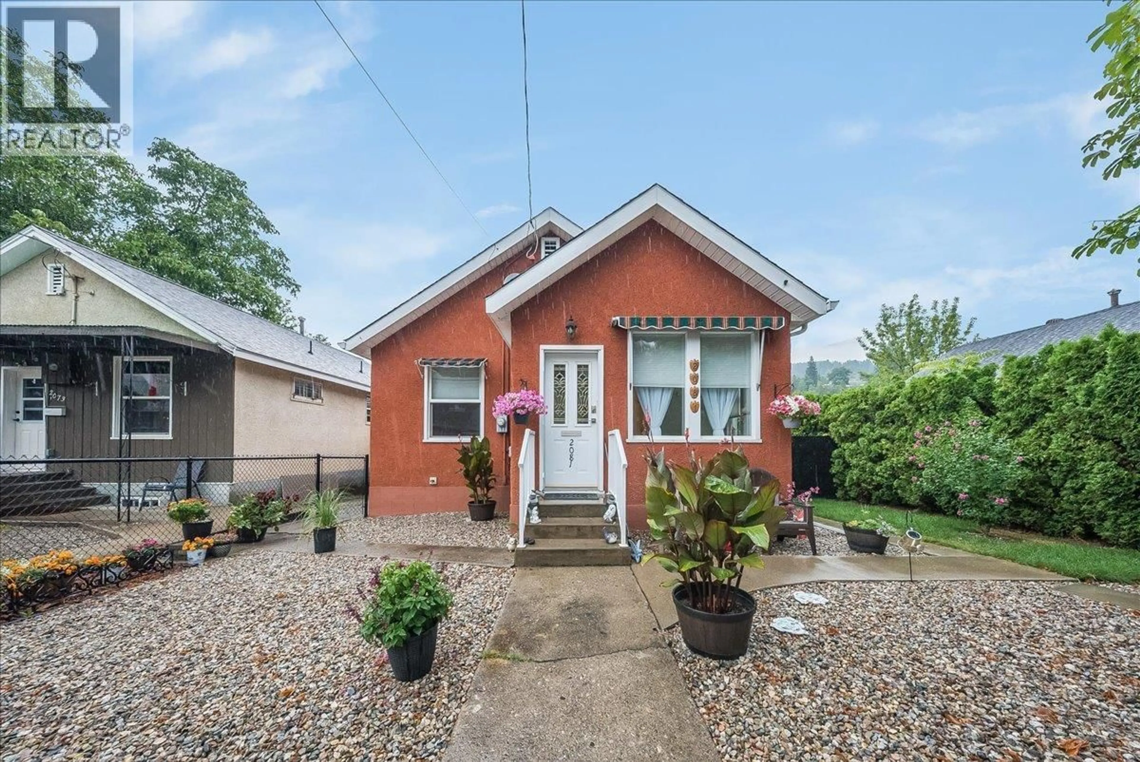 Home with brick exterior material, street for 2081 SECOND AVENUE, Trail British Columbia V1R1N4