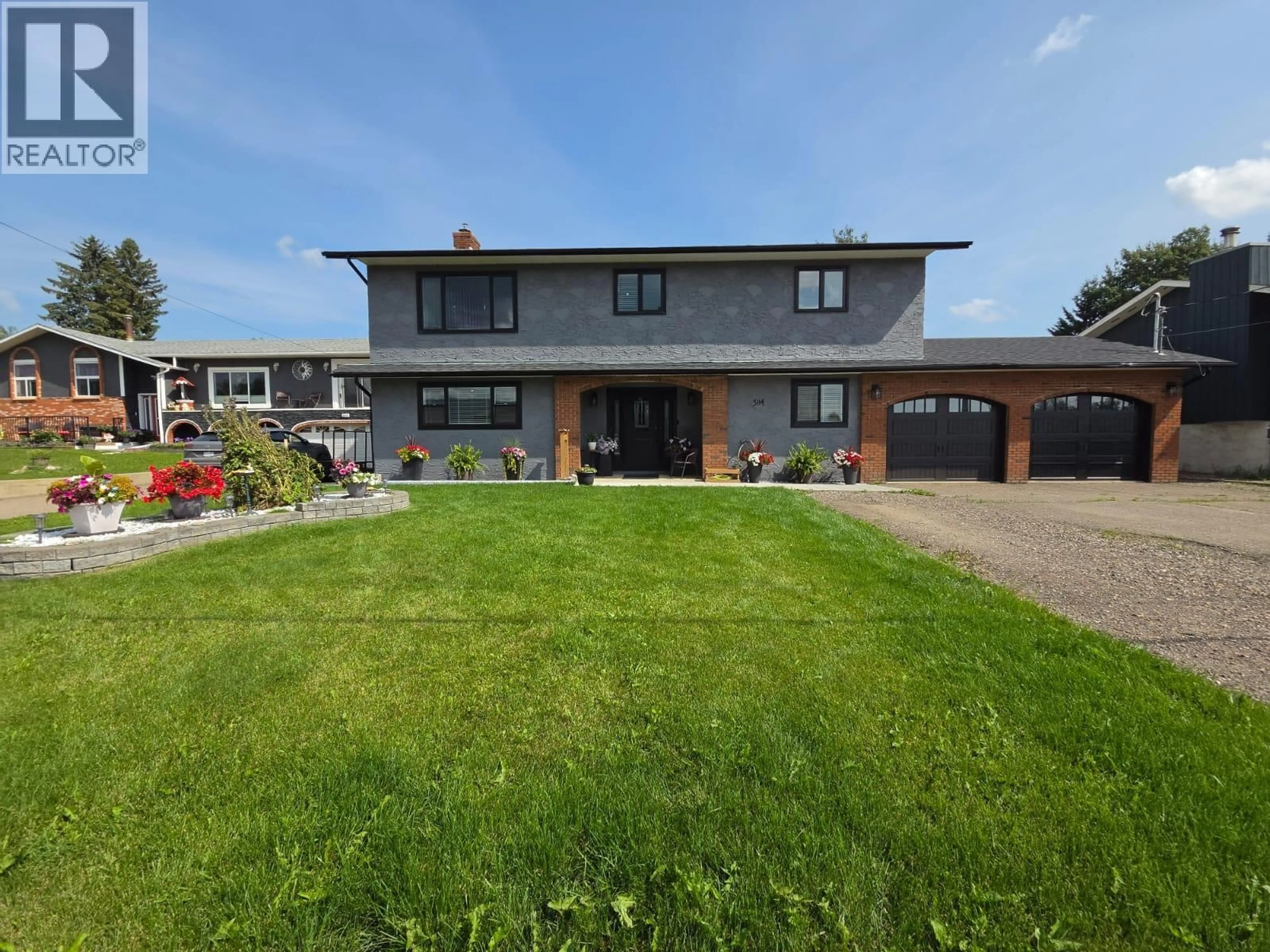A pic from outside/outdoor area/front of a property/back of a property/a pic from drone, building for 5114 43A STREET NORTHEAST, Chetwynd British Columbia V0C1J0