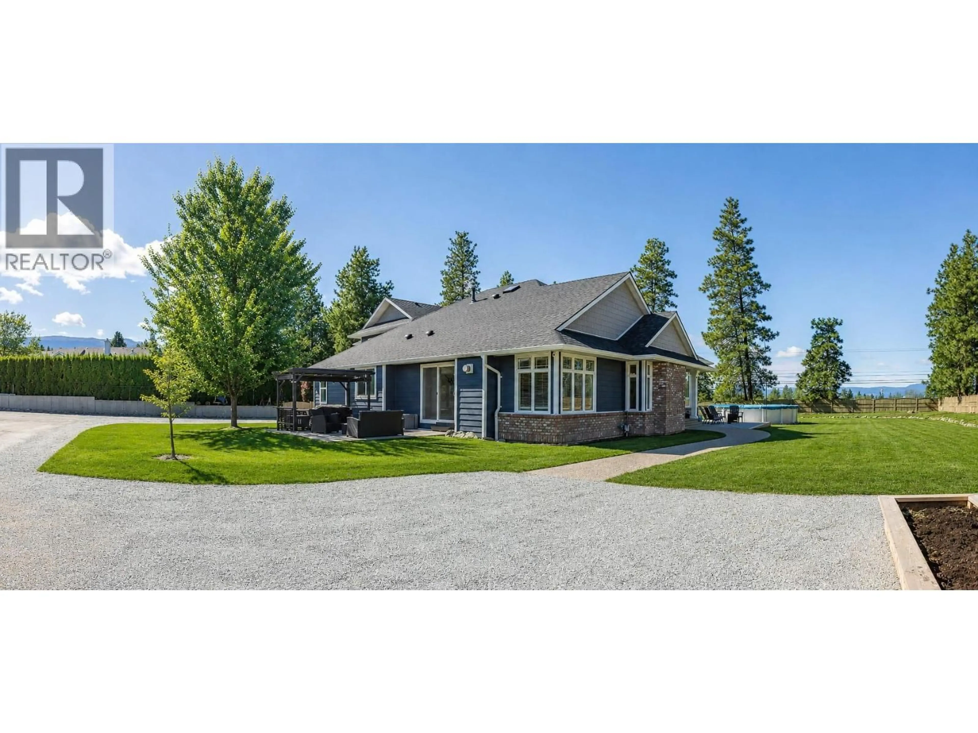 A pic from outside/outdoor area/front of a property/back of a property/a pic from drone, unknown for 3350 LARKSPUR COURT, Kelowna British Columbia V1W4E4