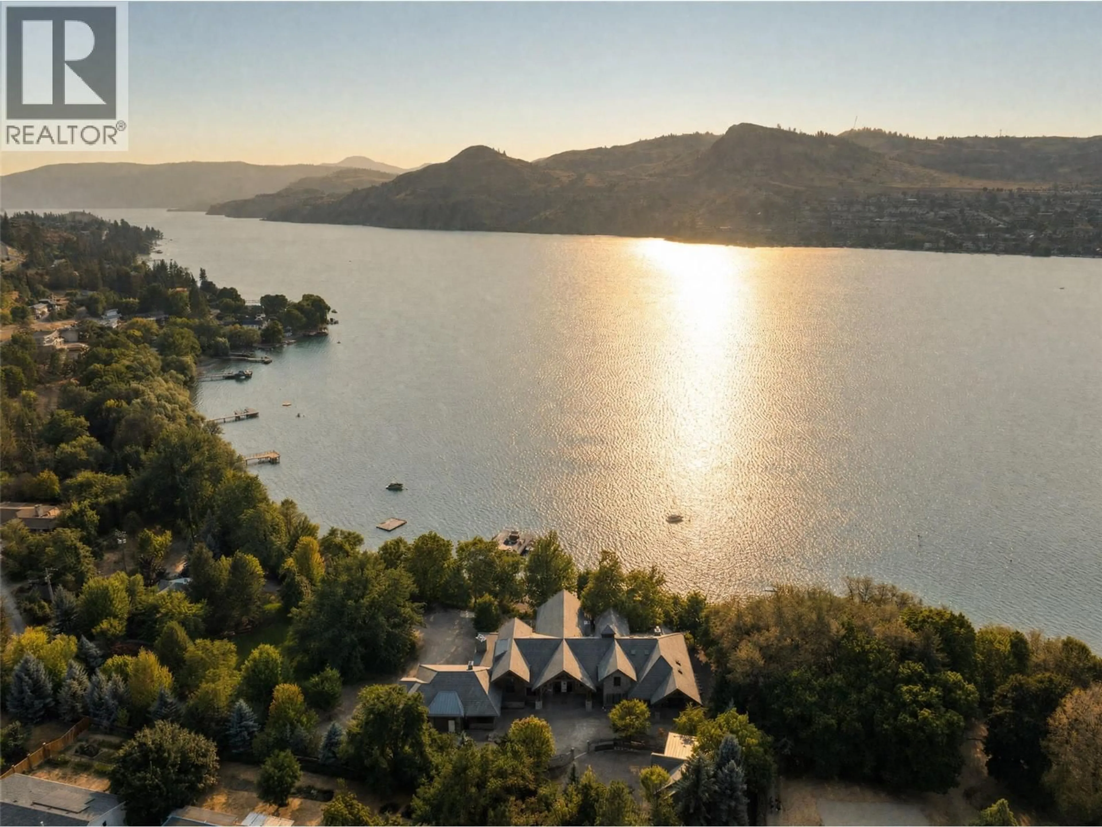 A pic from outside/outdoor area/front of a property/back of a property/a pic from drone, water/lake/river/ocean view for 12407 COLDSTREAM CREEK ROAD, Coldstream British Columbia V1B1G2