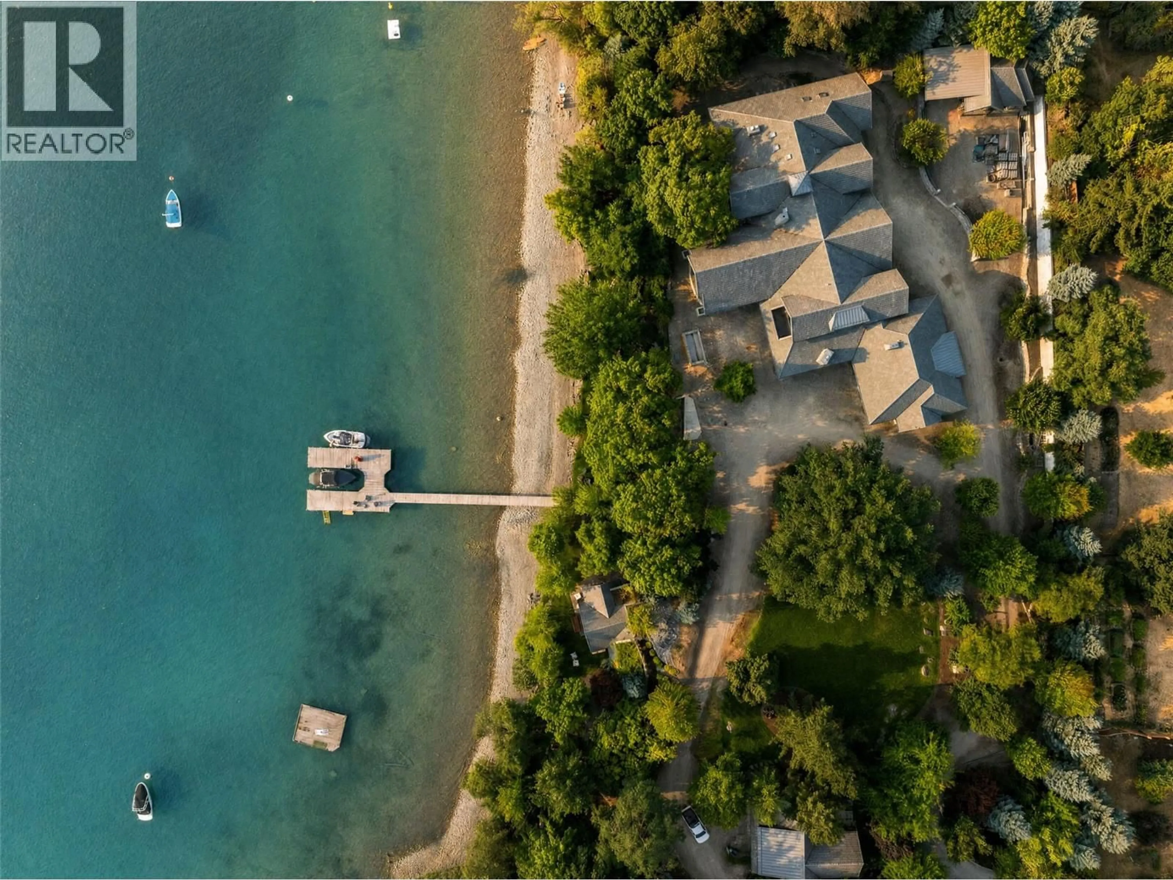 A pic from outside/outdoor area/front of a property/back of a property/a pic from drone, water/lake/river/ocean view for 12407 COLDSTREAM CREEK ROAD, Coldstream British Columbia V1B1G2