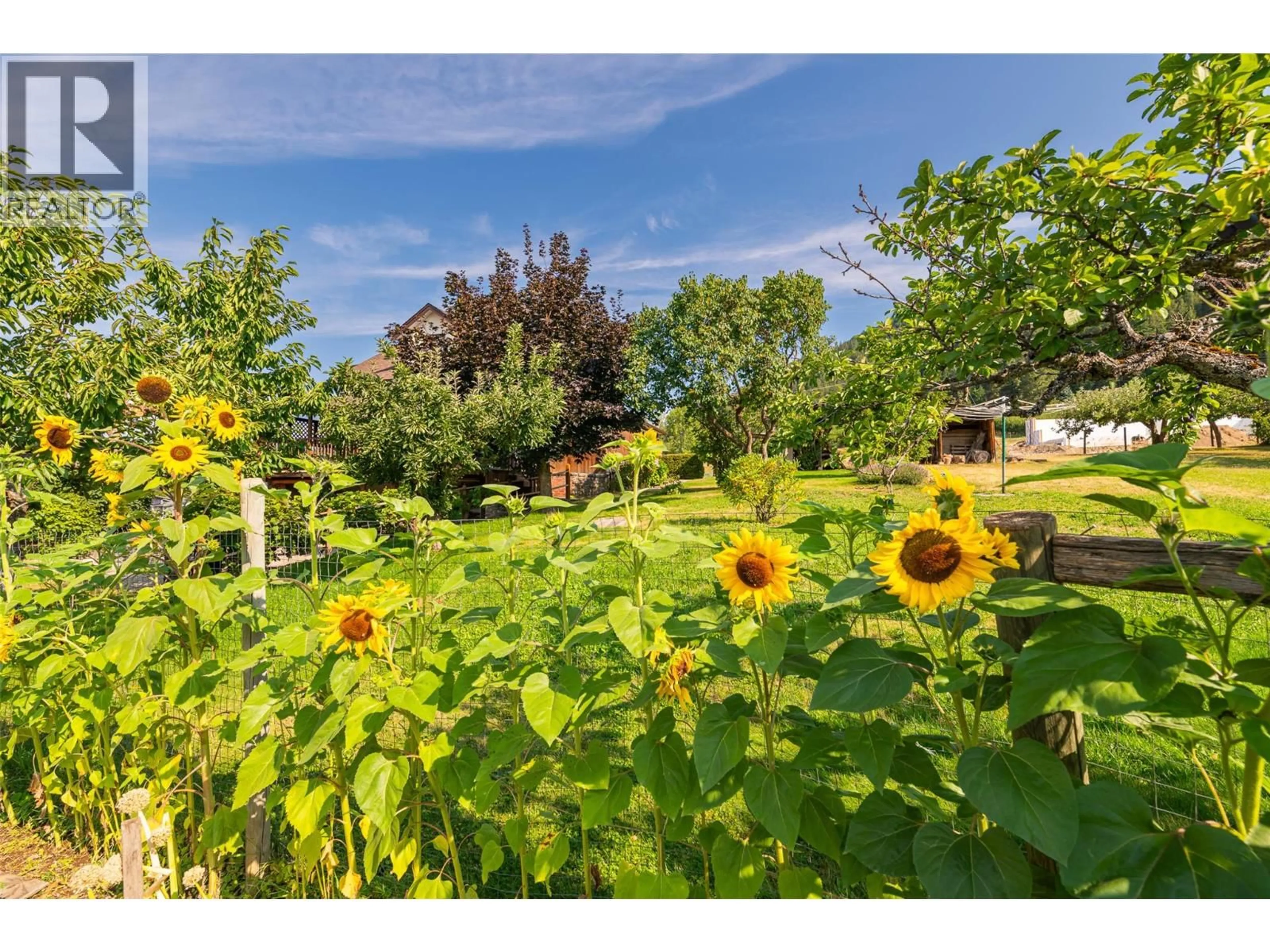 A pic from outside/outdoor area/front of a property/back of a property/a pic from drone, unknown for 1843 MCLAREN STREET, Creston British Columbia V0B1G5