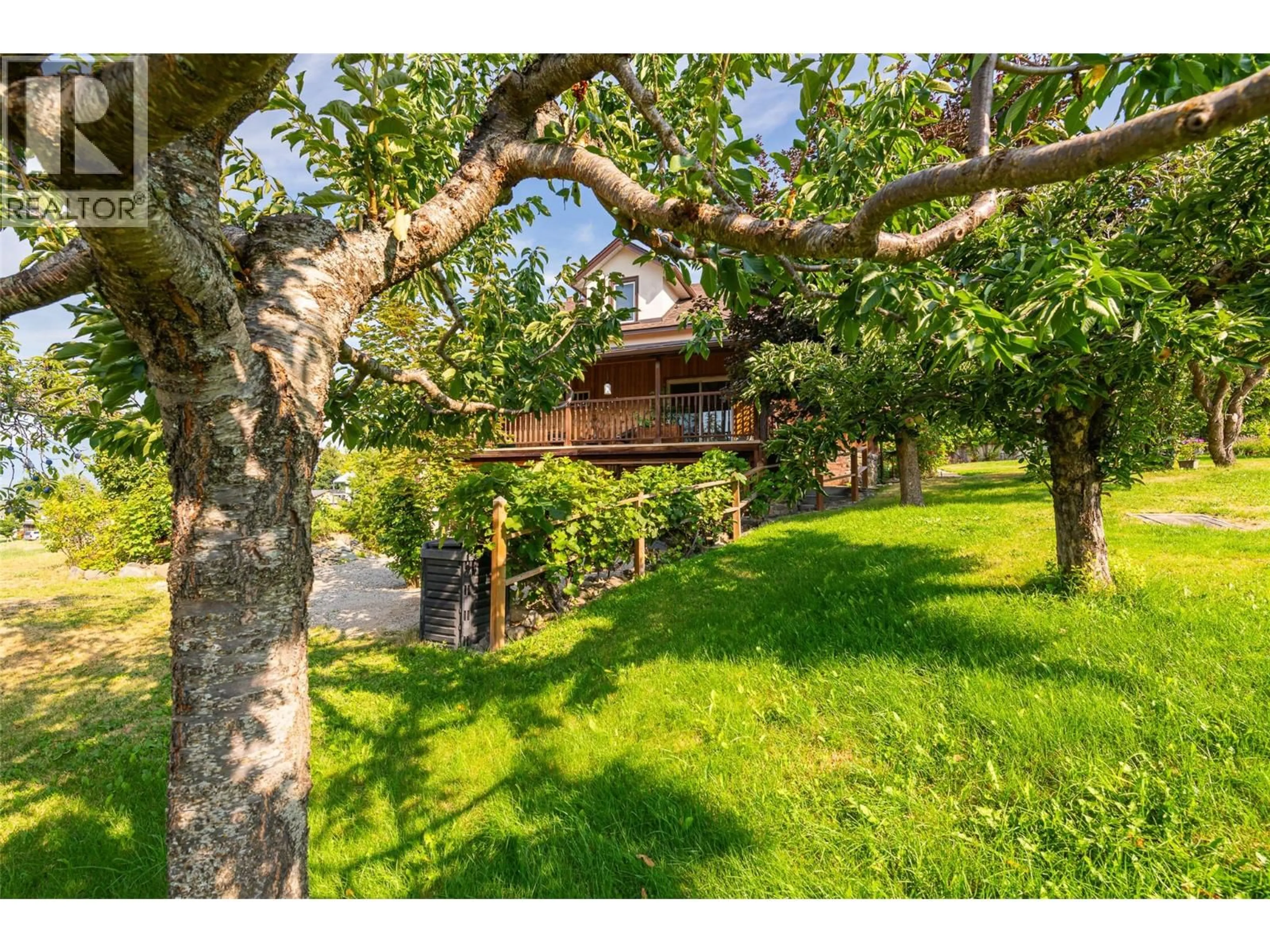 A pic from outside/outdoor area/front of a property/back of a property/a pic from drone, forest/trees view for 1843 MCLAREN STREET, Creston British Columbia V0B1G5