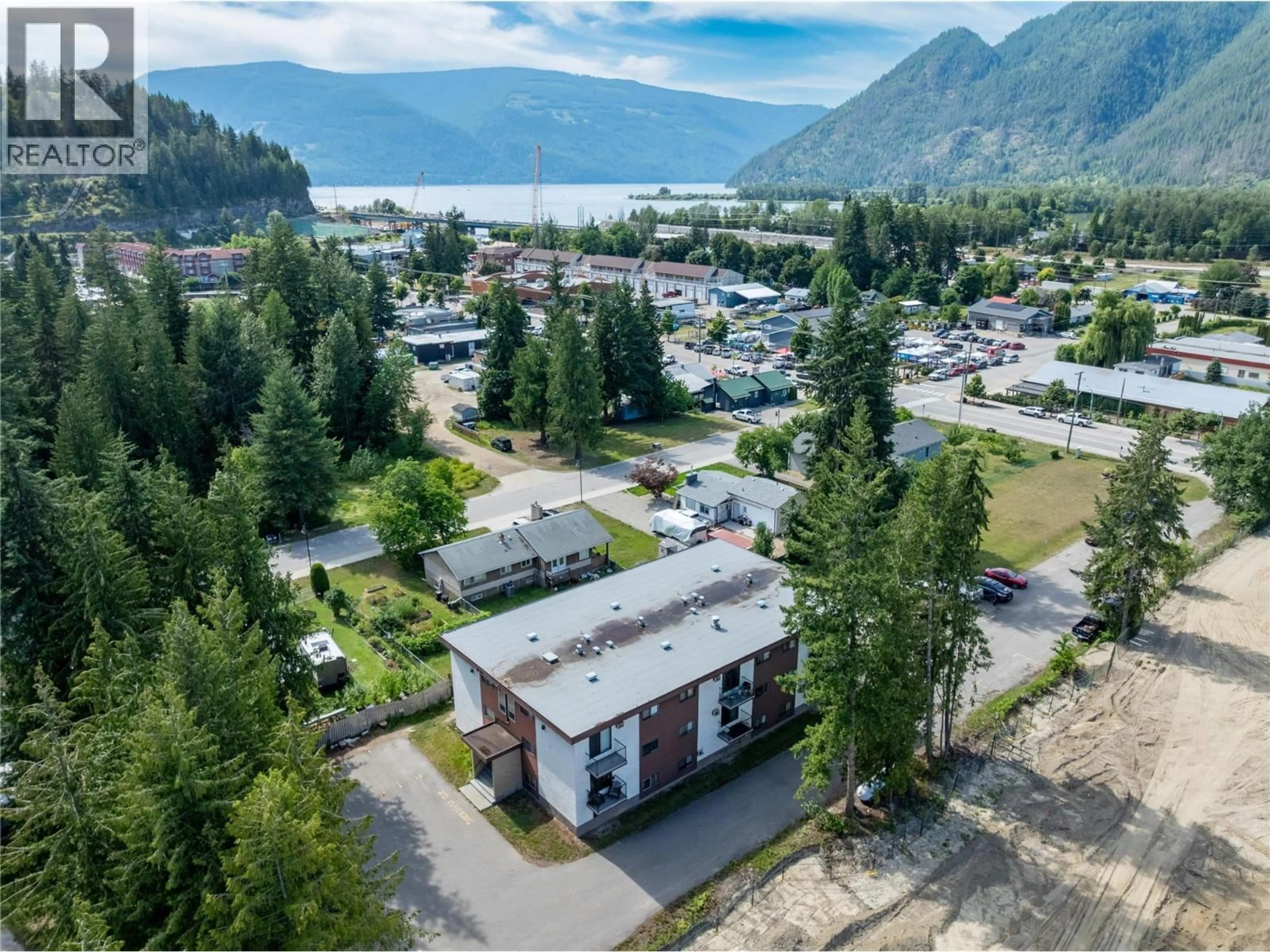 A pic from outside/outdoor area/front of a property/back of a property/a pic from drone, mountain view for 204 - 409 MAIN STREET, Sicamous British Columbia V0E2V0