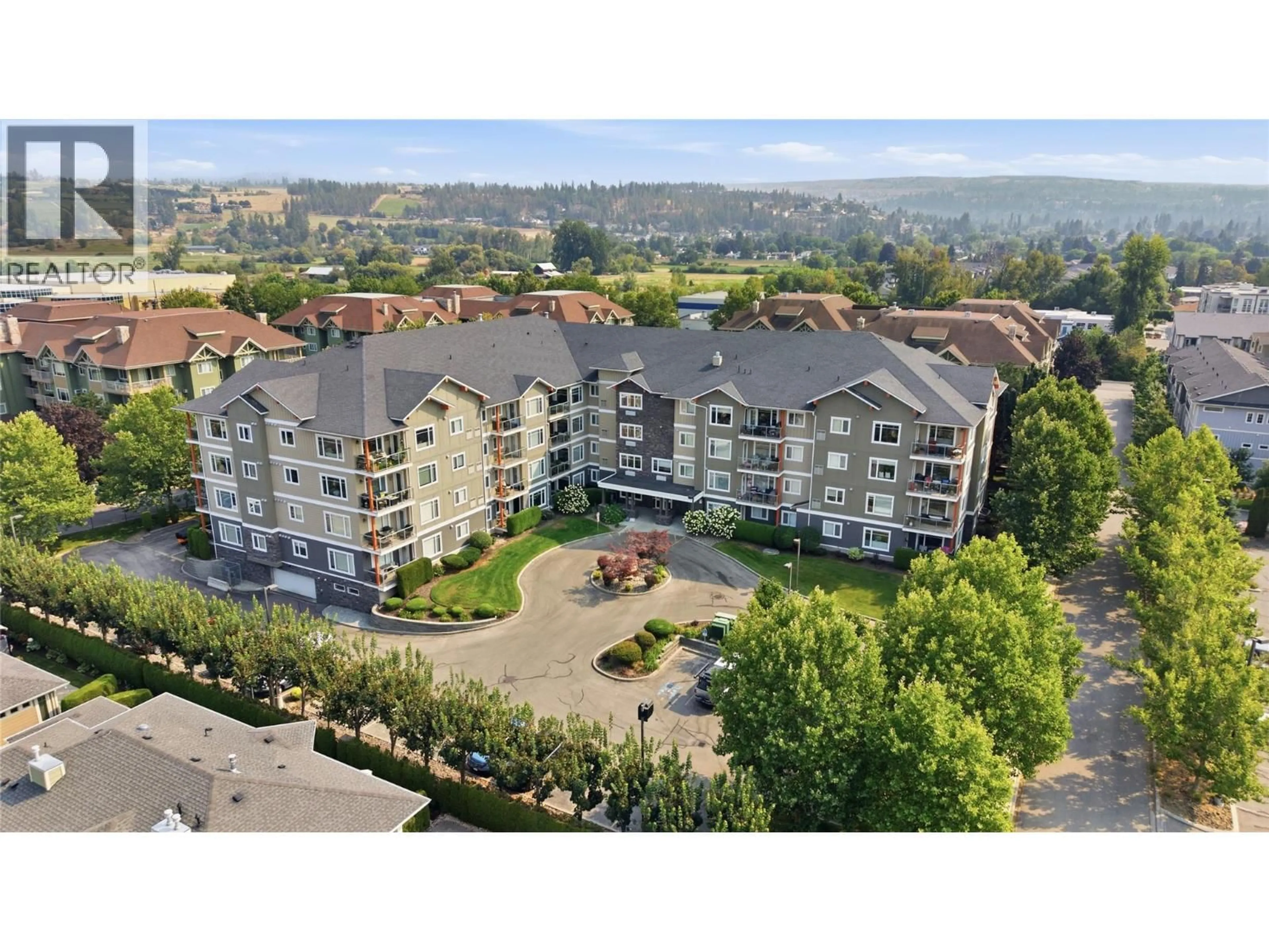 A pic from outside/outdoor area/front of a property/back of a property/a pic from drone, mountain view for 205 - 660 LEQUIME ROAD, Kelowna British Columbia V1W1A4