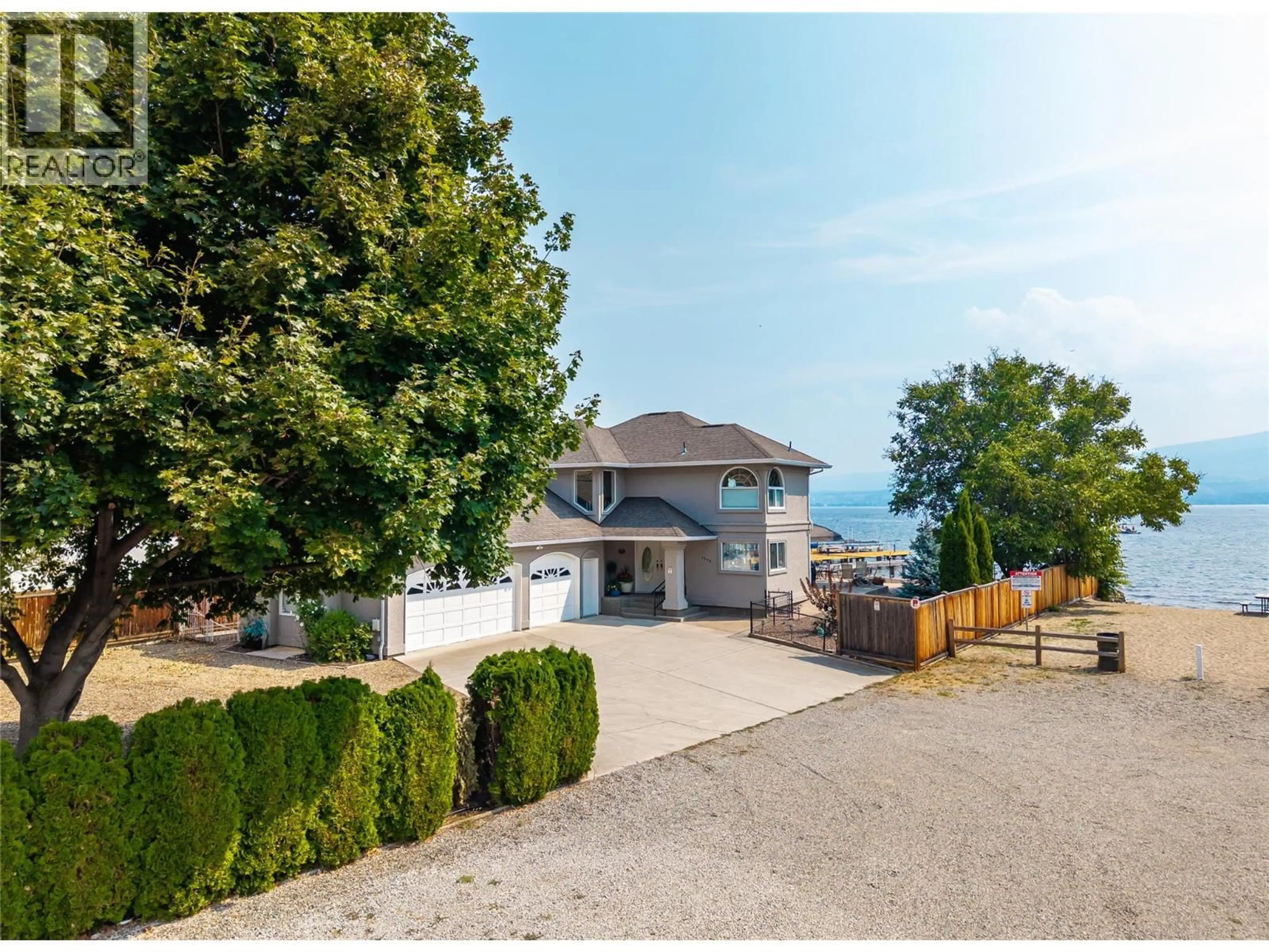 A pic from outside/outdoor area/front of a property/back of a property/a pic from drone, water/lake/river/ocean view for 1339 GREEN BAY ROAD, West Kelowna British Columbia V4T2B6