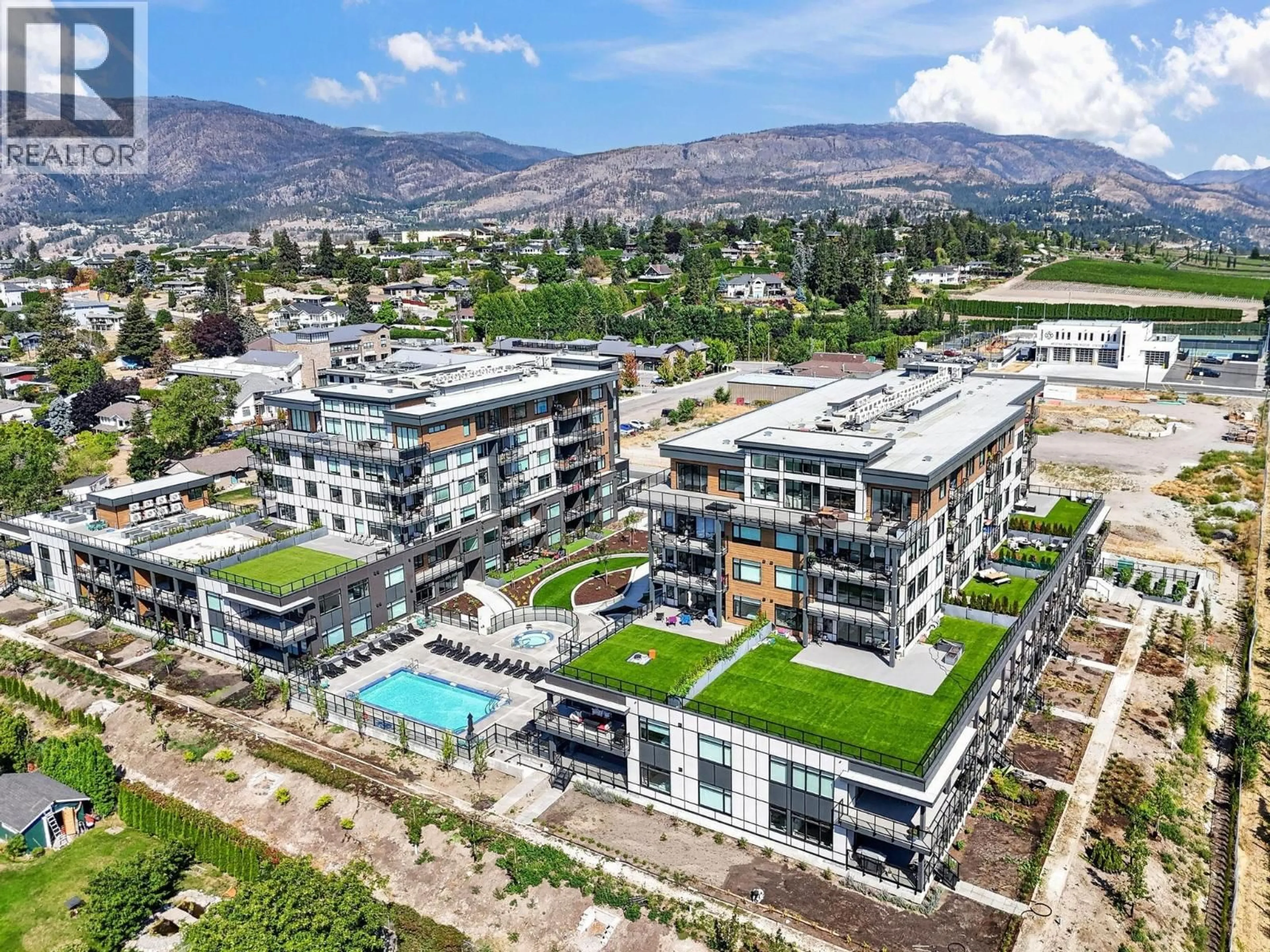 A pic from outside/outdoor area/front of a property/back of a property/a pic from drone, mountain view for 601 - 2780 OLALLA ROAD, West Kelowna British Columbia V1Z2A9