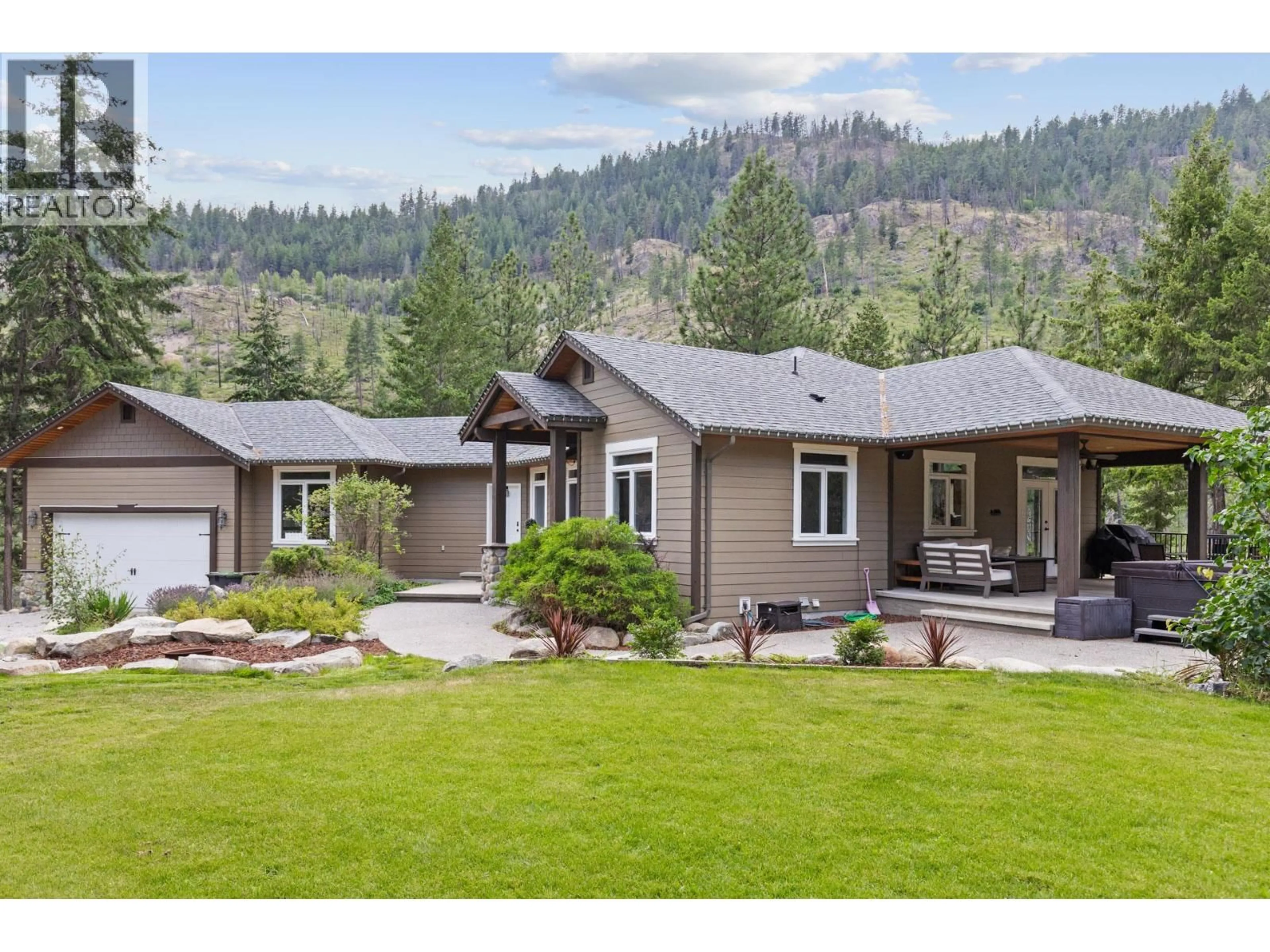 Home with vinyl exterior material, mountain view for 4802 TREPANIER ROAD, Peachland British Columbia V0H1X2
