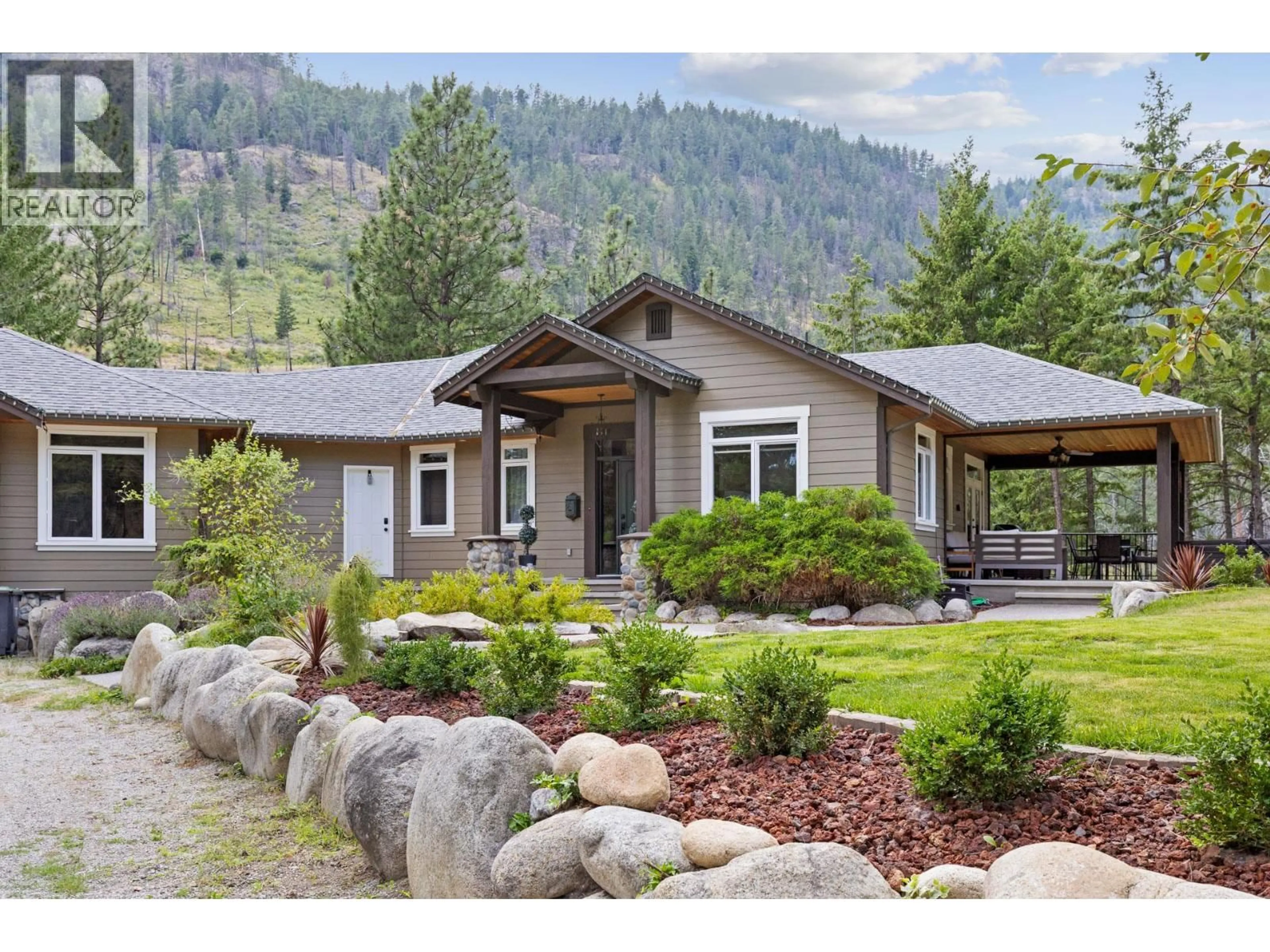Home with vinyl exterior material, mountain view for 4802 TREPANIER ROAD, Peachland British Columbia V0H1X2