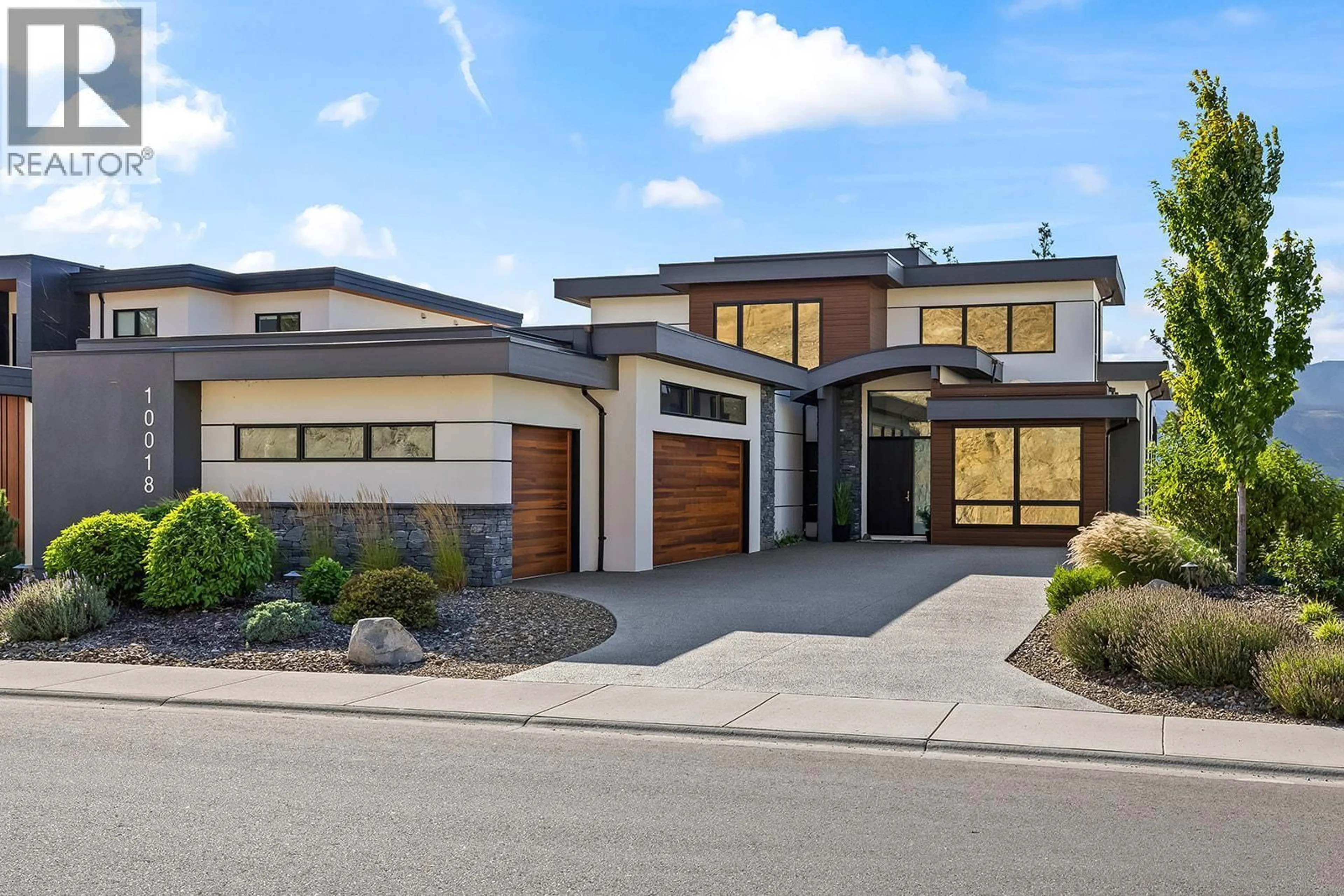 Home with brick exterior material, street for 10018 BEACON HILL DRIVE, Lake Country British Columbia V4V0A9