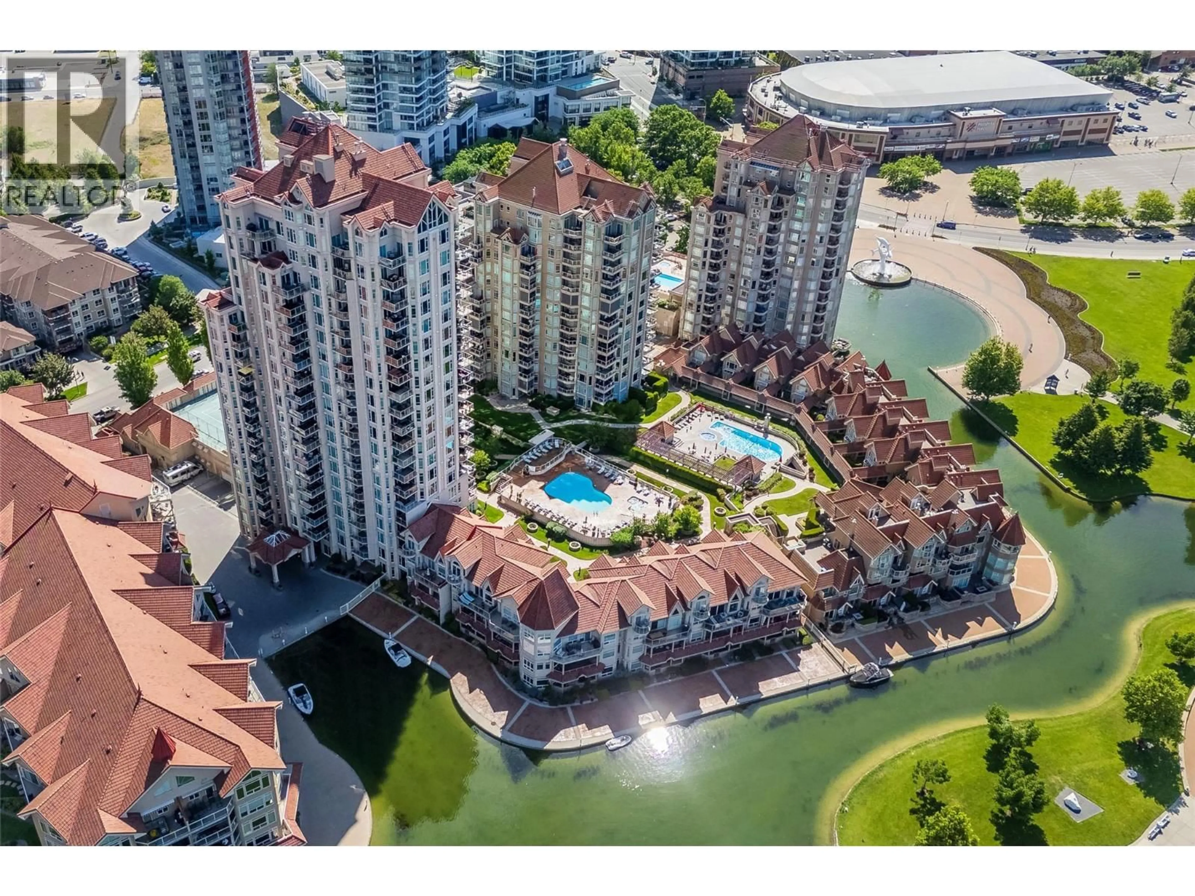 A pic from outside/outdoor area/front of a property/back of a property/a pic from drone, water/lake/river/ocean view for 1404 - 1128 SUNSET DRIVE, Kelowna British Columbia V1Y9W7