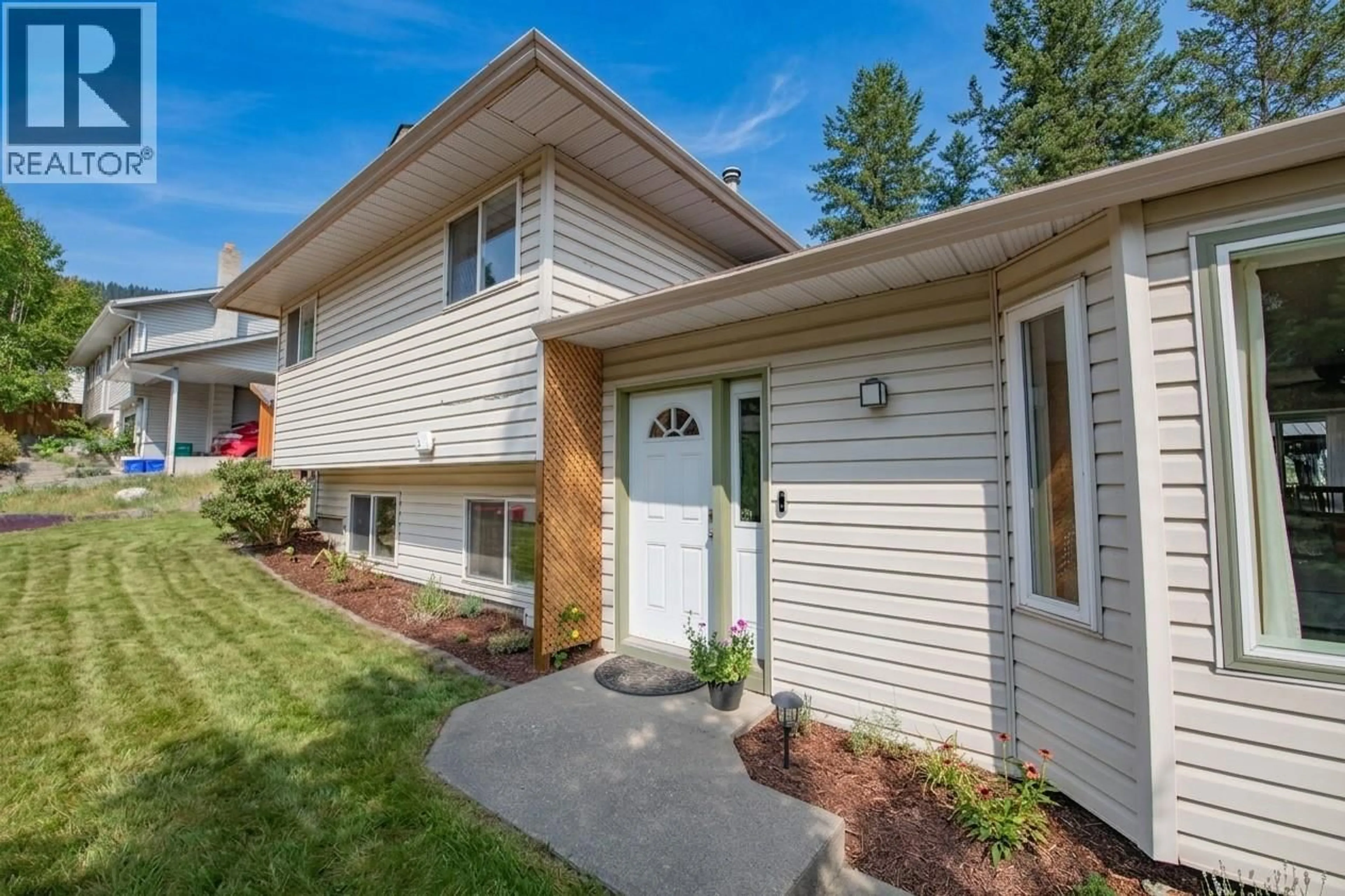 Home with vinyl exterior material, street for 2209 LEBLANC STREET, Lumby British Columbia V0E2G0