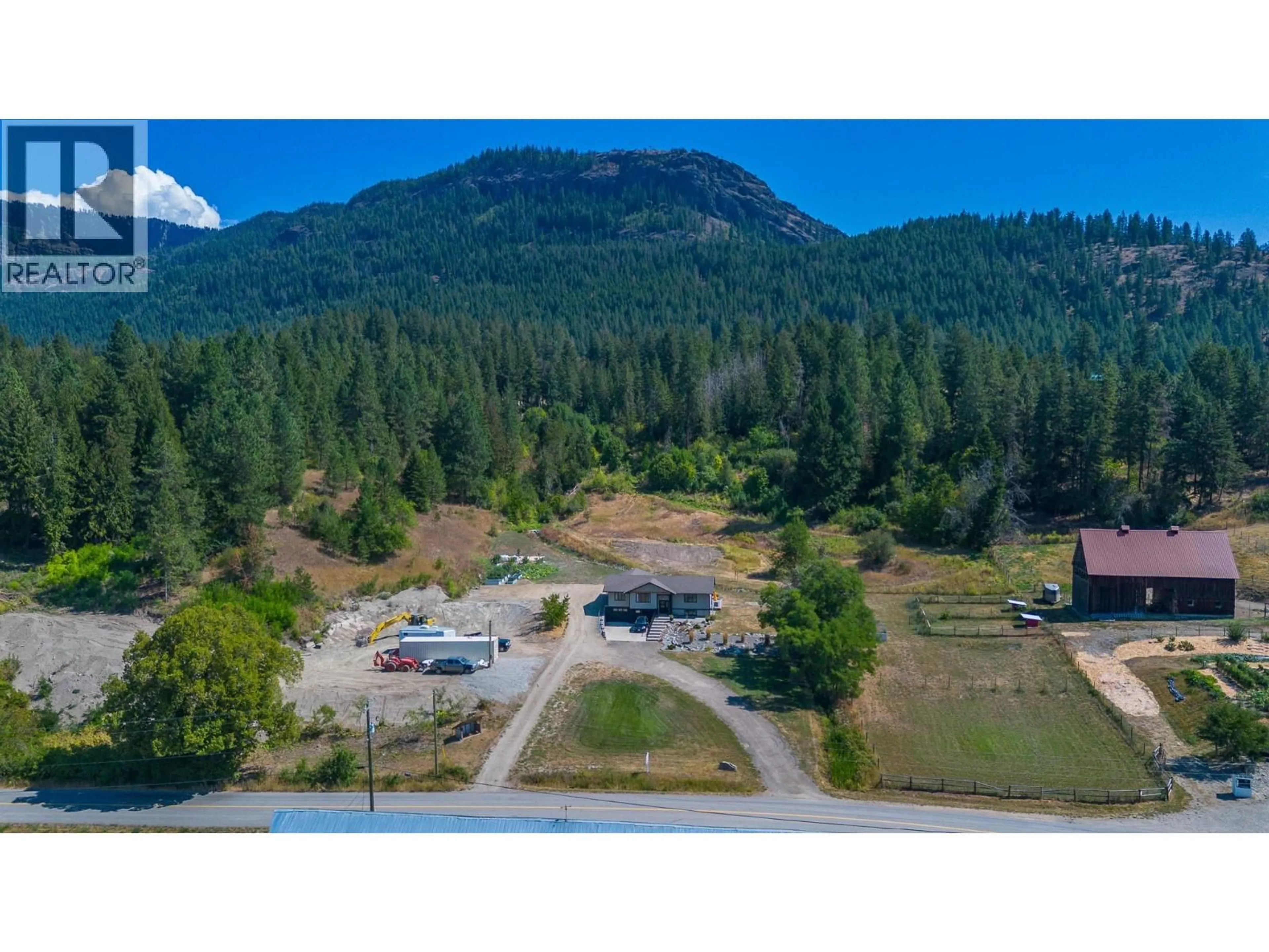A pic from outside/outdoor area/front of a property/back of a property/a pic from drone, mountain view for 211 ENDERBY GRINDROD ROAD, Enderby British Columbia V0E1V4