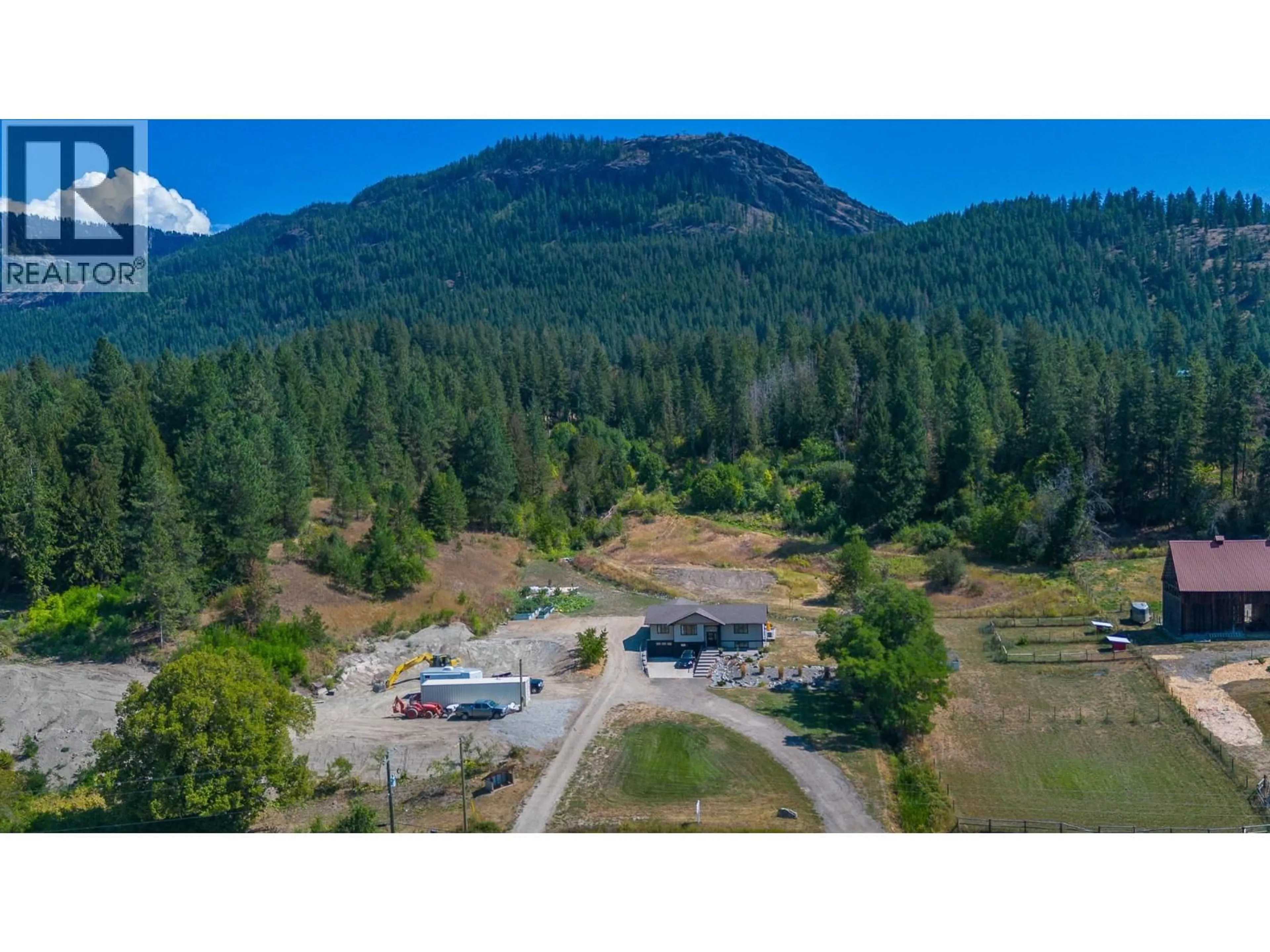 A pic from outside/outdoor area/front of a property/back of a property/a pic from drone, mountain view for 211 ENDERBY GRINDROD ROAD, Enderby British Columbia V0E1V4