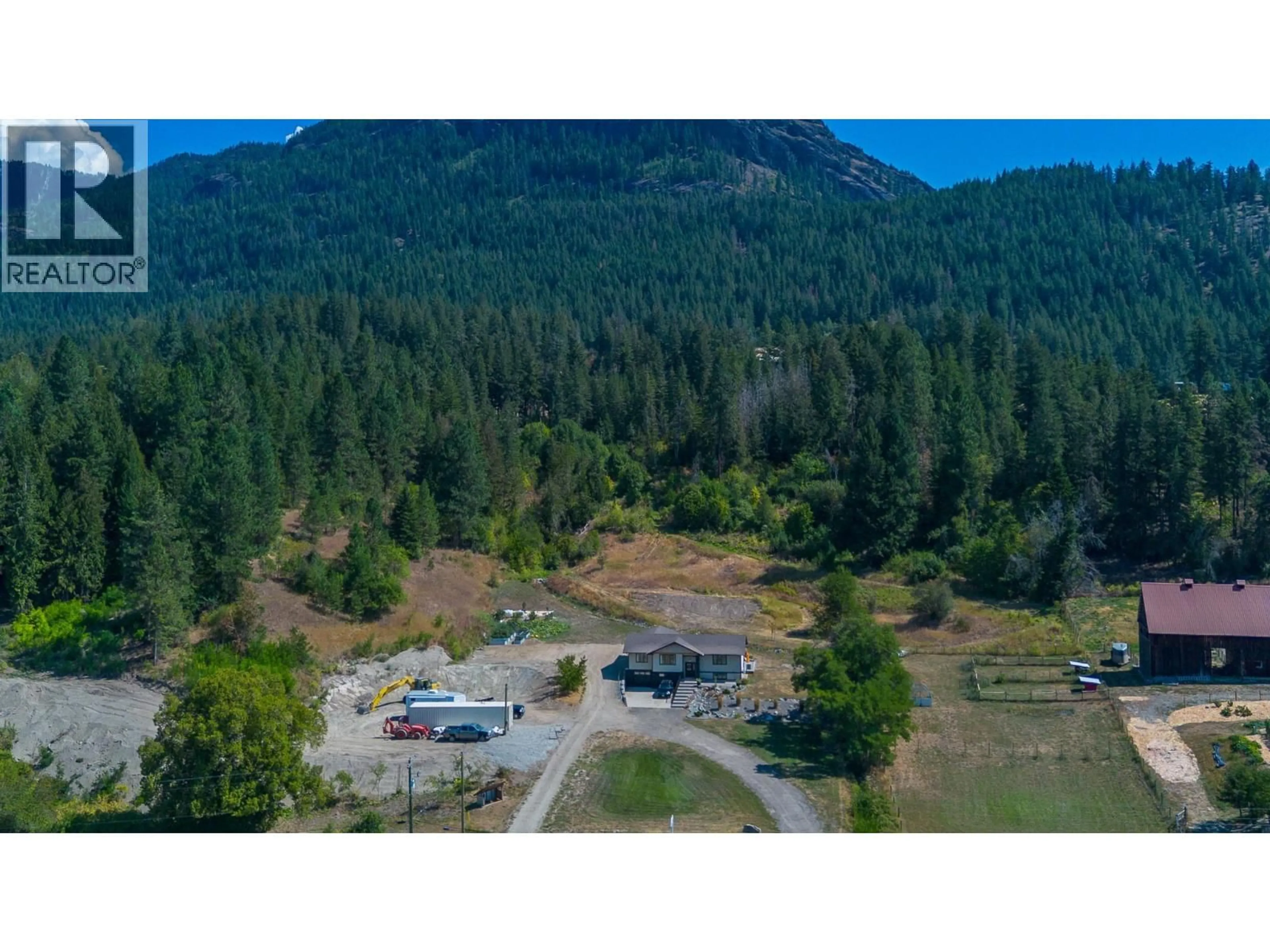 A pic from outside/outdoor area/front of a property/back of a property/a pic from drone, mountain view for 211 ENDERBY GRINDROD ROAD, Enderby British Columbia V0E1V4