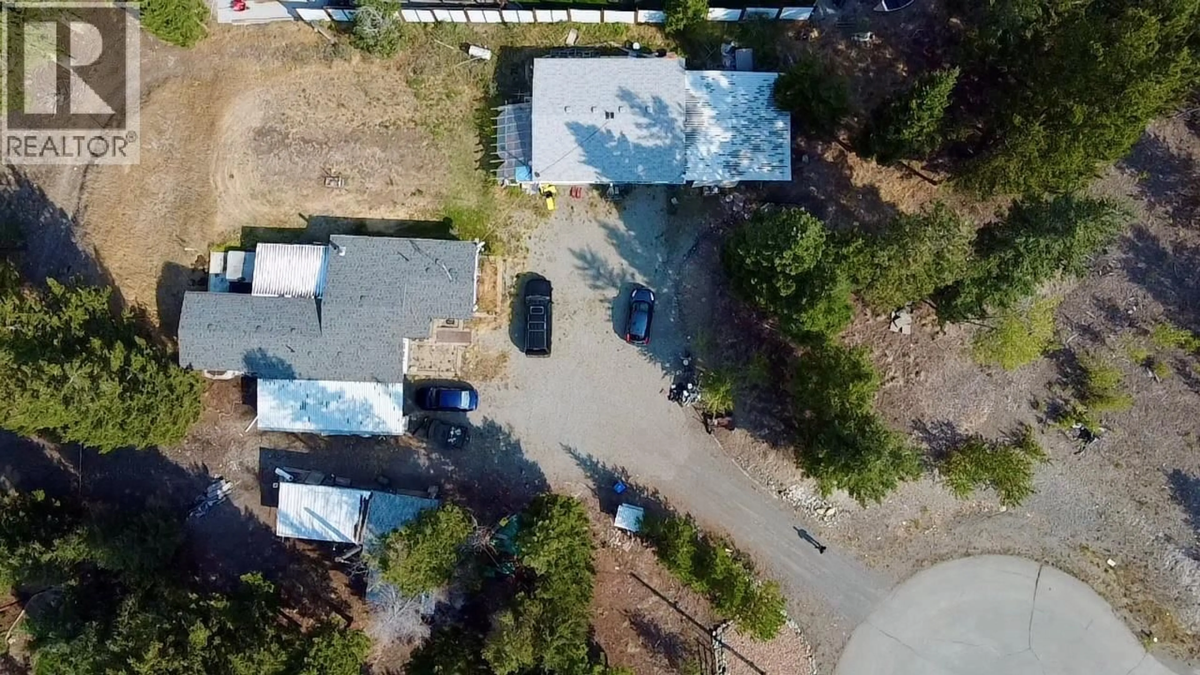 A pic from outside/outdoor area/front of a property/back of a property/a pic from drone, street for 170 ARD RIGH ROAD, Logan Lake British Columbia V0K1W0