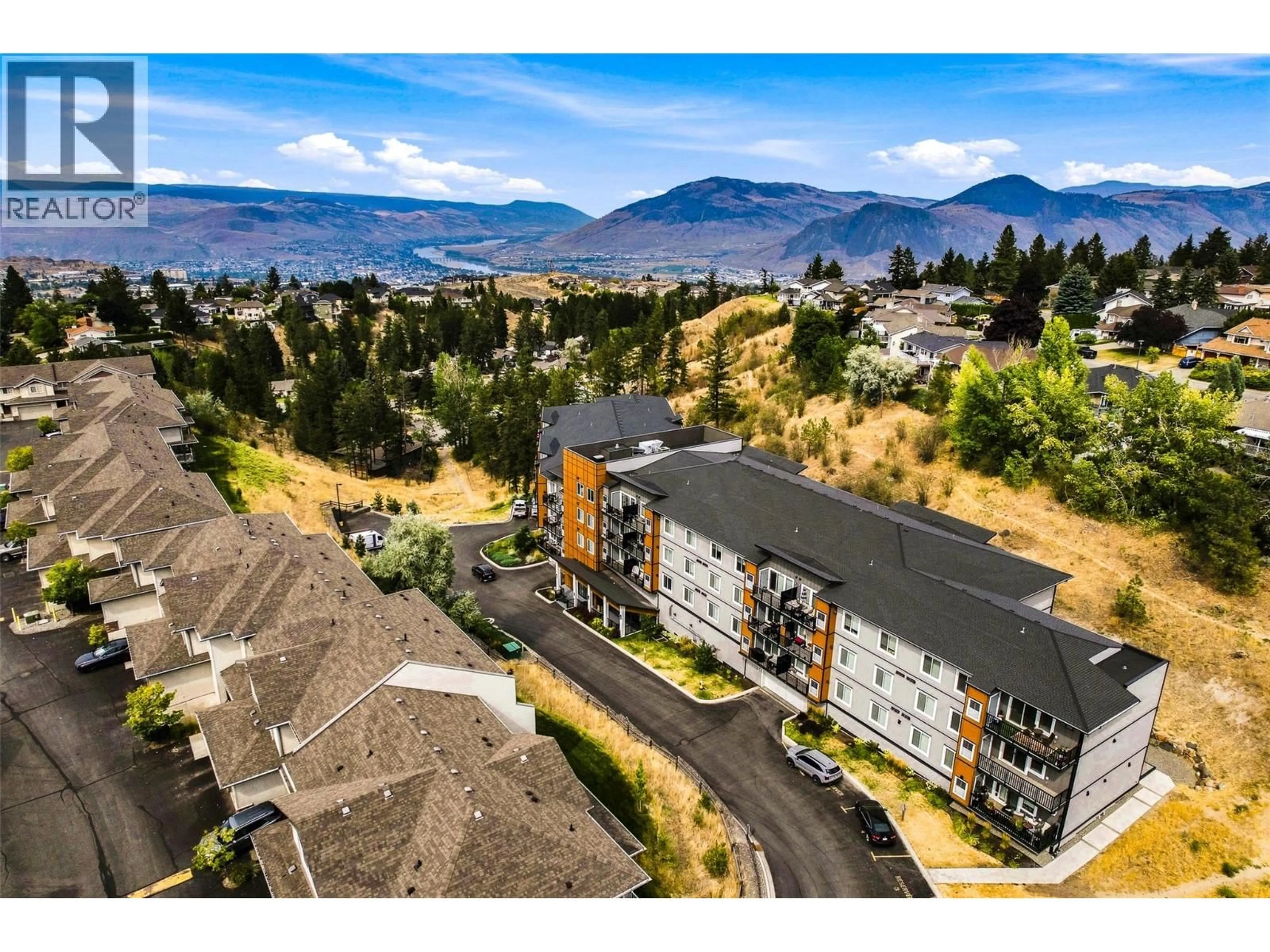 A pic from outside/outdoor area/front of a property/back of a property/a pic from drone, mountain view for 105 - 2046 ROBSON PLACE, Kamloops British Columbia V2E0A5
