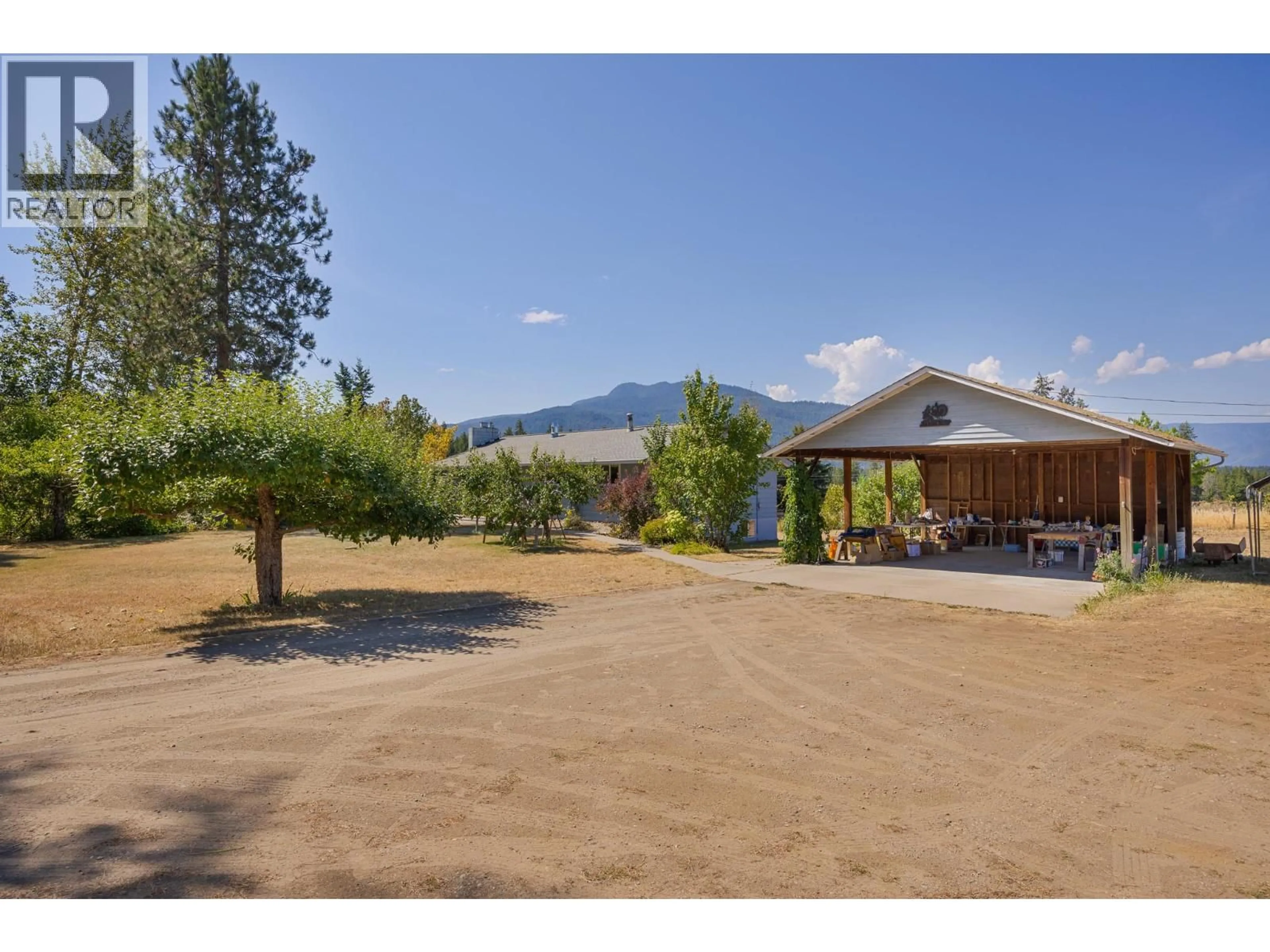A pic from outside/outdoor area/front of a property/back of a property/a pic from drone, mountain view for 1141 70 STREET SOUTHEAST, Salmon Arm British Columbia V1E1X8