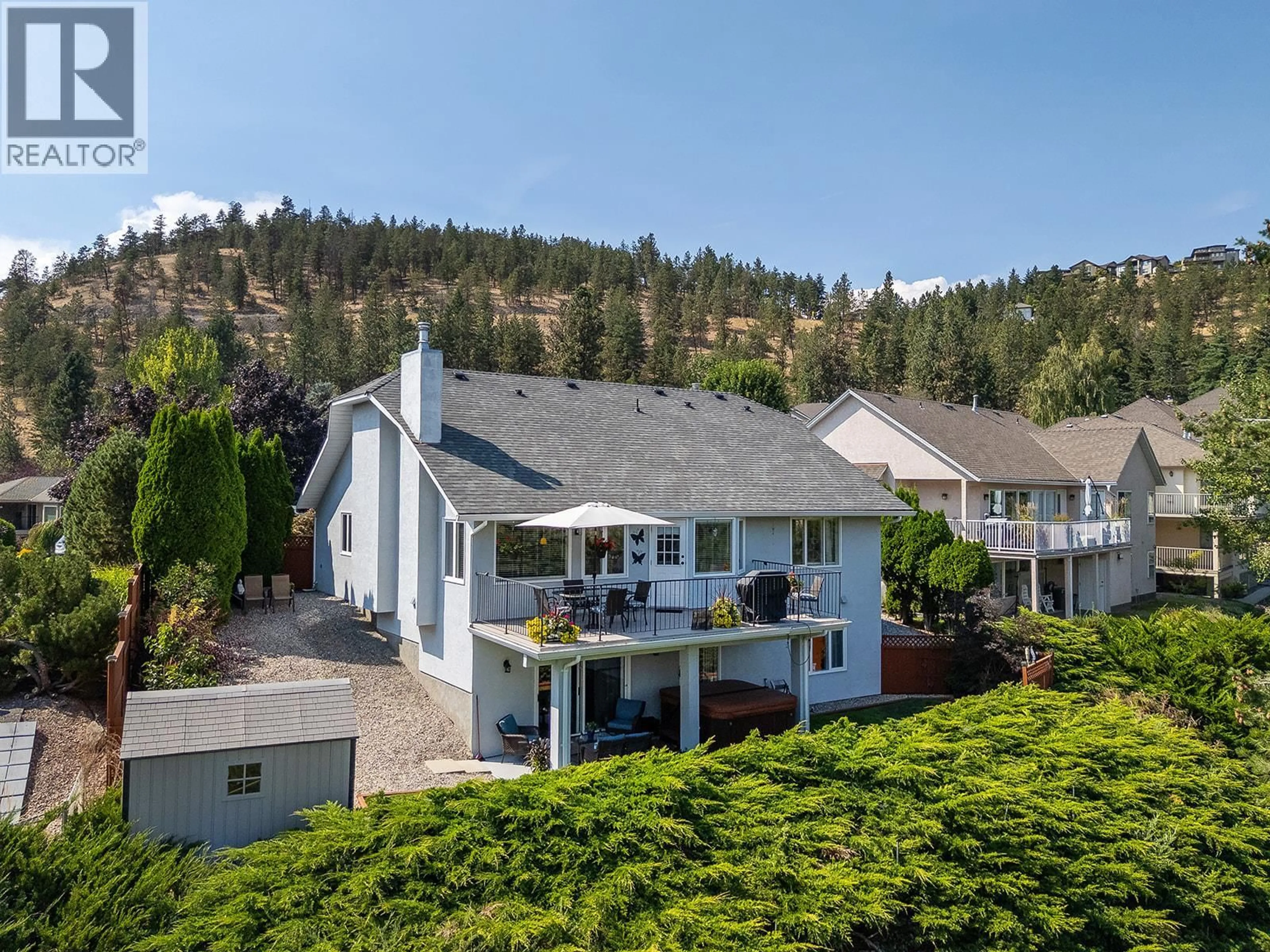 A pic from outside/outdoor area/front of a property/back of a property/a pic from drone, mountain view for 735 NAHANNI PLACE, Kelowna British Columbia V1V1N5